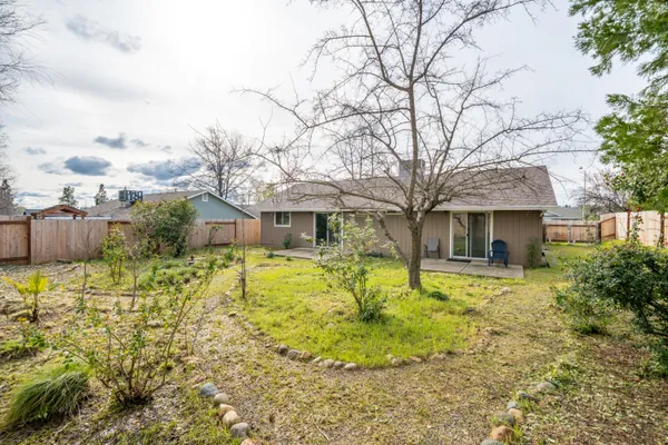 a front view of house with swimming pool