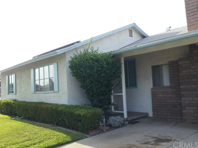 128 West Van Koevering Street Rialto, CA 92376 - Photo 1 of 1 Front entry, note fireplace chimney.
