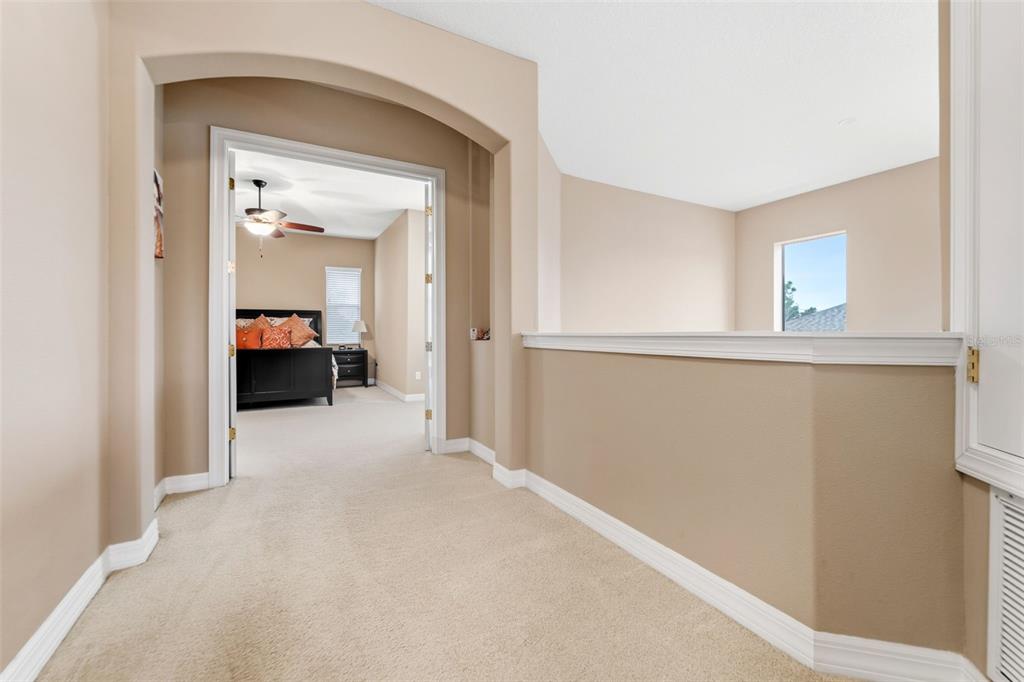 4460 Birchfield Loop Spring Hill, FL 34609 - Photo 18 of 38 a view of a room that has a bed
