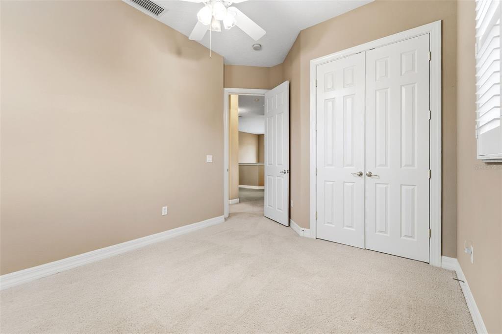 4460 Birchfield Loop Spring Hill, FL 34609 - Photo 25 of 38 an empty room with a bathroom