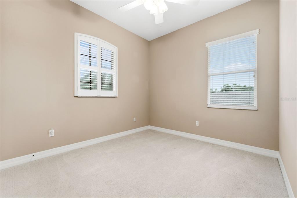 4460 Birchfield Loop Spring Hill, FL 34609 - Photo 26 of 38 an empty room with a window