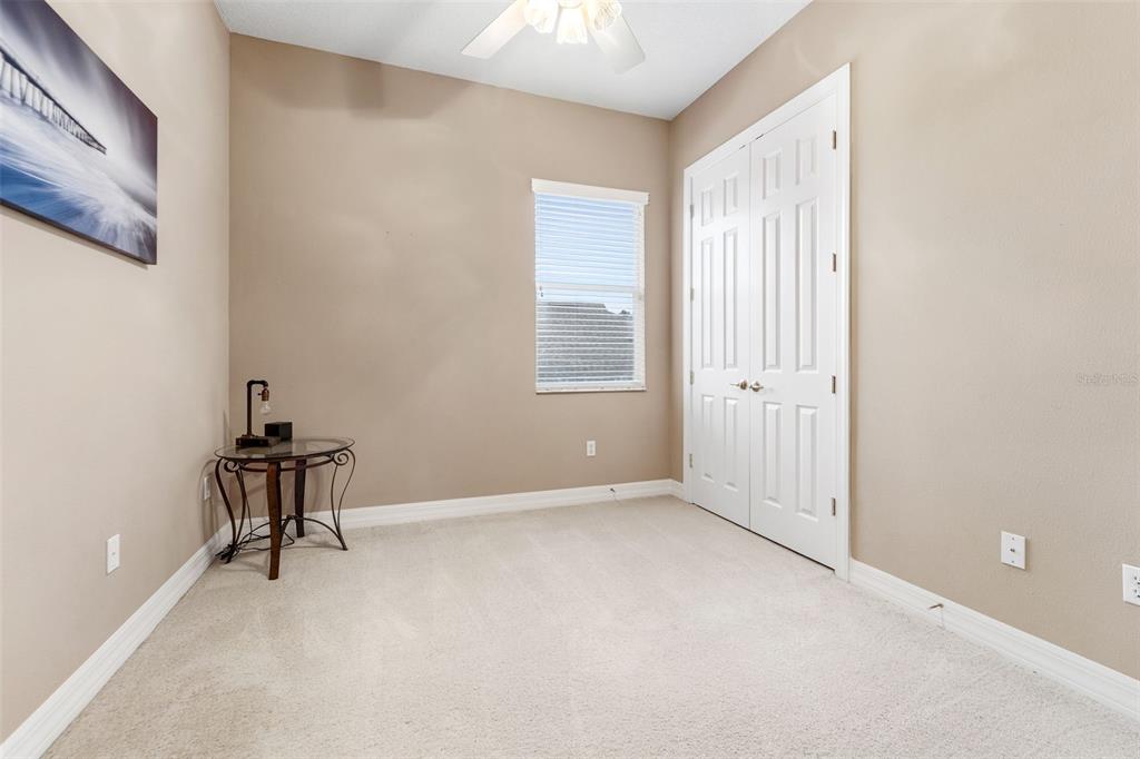 4460 Birchfield Loop Spring Hill, FL 34609 - Photo 29 of 38 a view of an empty room with a window