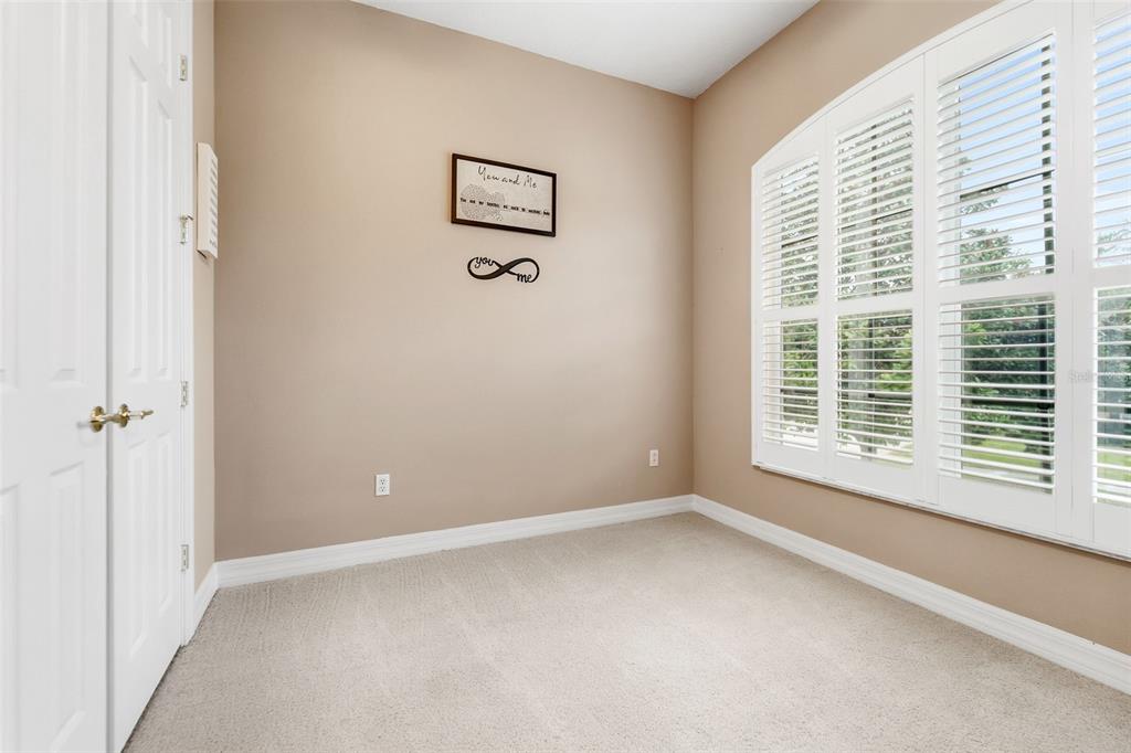 4460 Birchfield Loop Spring Hill, FL 34609 - Photo 31 of 38 a view of an empty room with a window