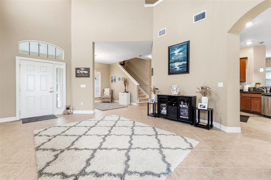 4460 Birchfield Loop Spring Hill, FL 34609 - Photo 6 of 38 a view of livingroom with furniture and workspace