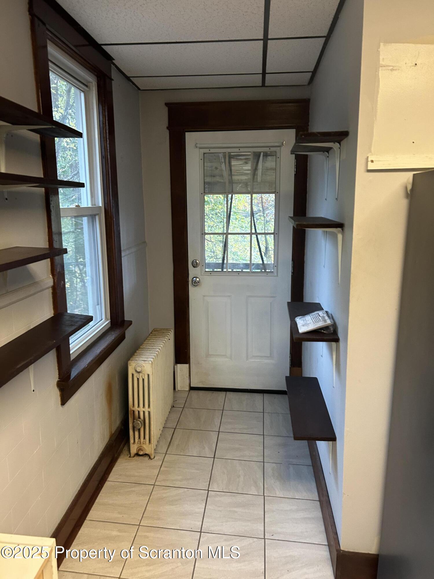 510 Moltke Avenue, Unit FIRST FLOOR #1 Scranton, PA 18505 - Photo 23 of 27 a view of entryway with a window and wooden floor