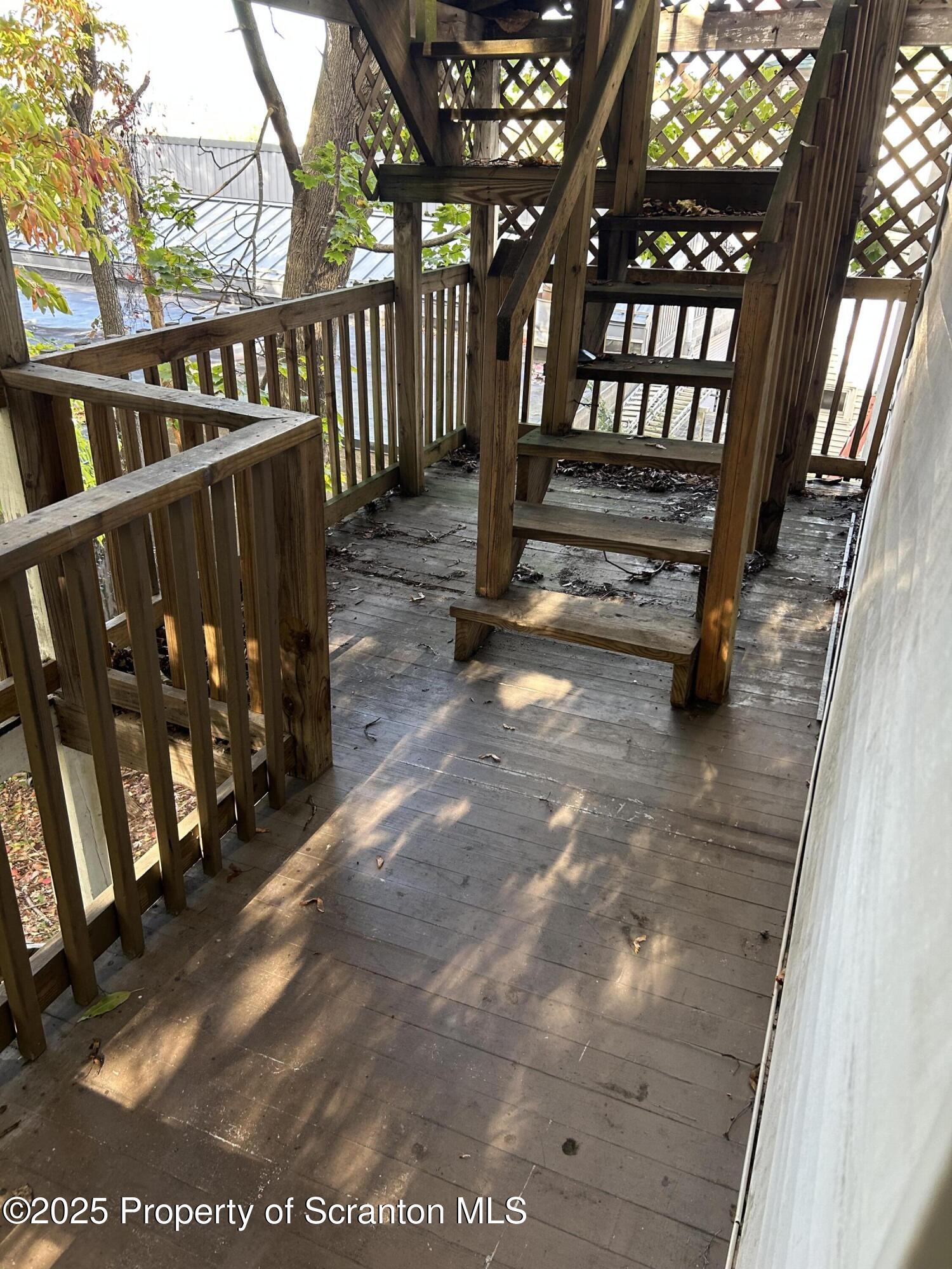 510 Moltke Avenue, Unit FIRST FLOOR #1 Scranton, PA 18505 - Photo 26 of 27 a view of a porch with wooden fence
