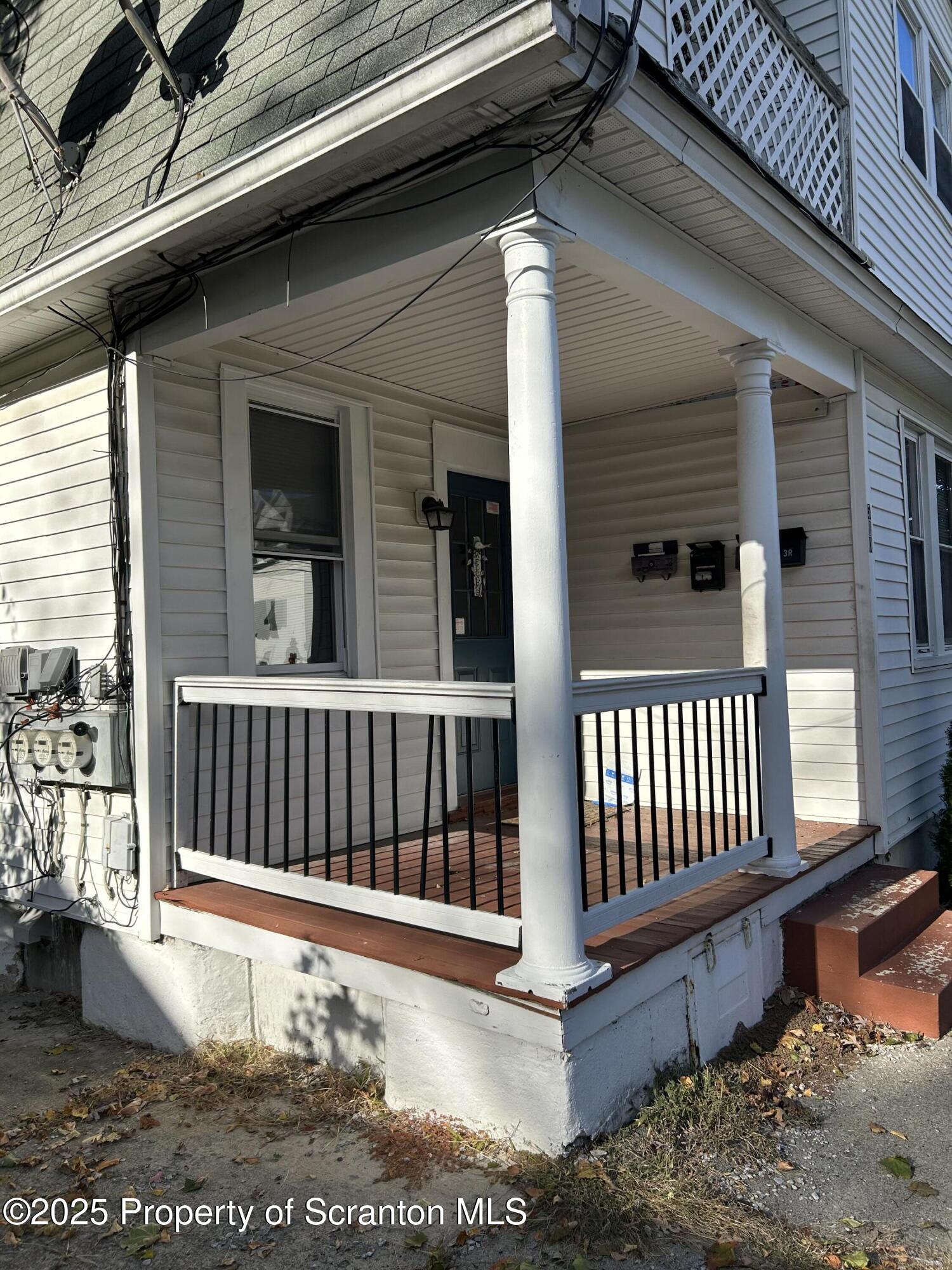 510 Moltke Avenue, Unit FIRST FLOOR #1 Scranton, PA 18505 - Photo 5 of 27 a view of a porch with a bench