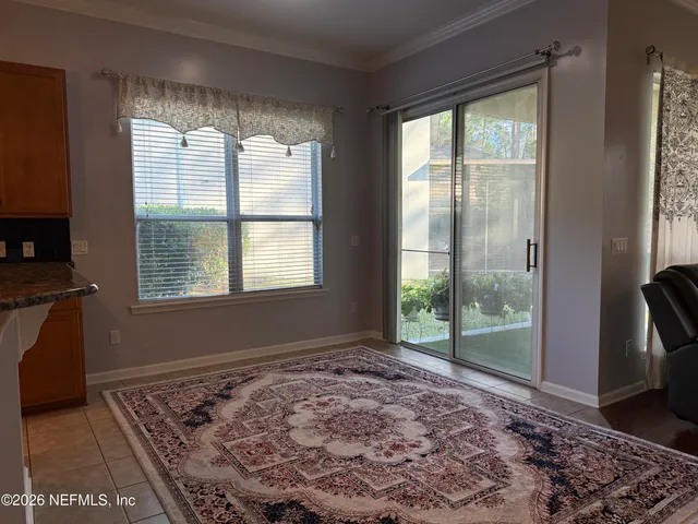a view of a room with a large window