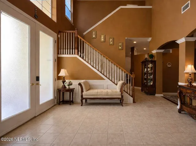 a view of entryway and workspace