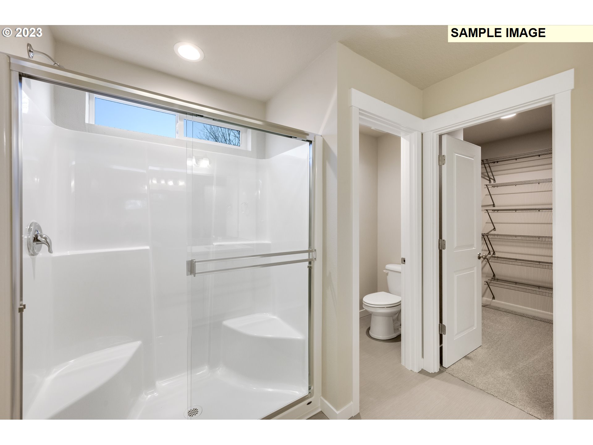 16881 Southeast Mist Layer Loop, Unit 531 Happy Valley, OR 97086 - Photo 13 of 32 a bathroom with a shower and a toilet