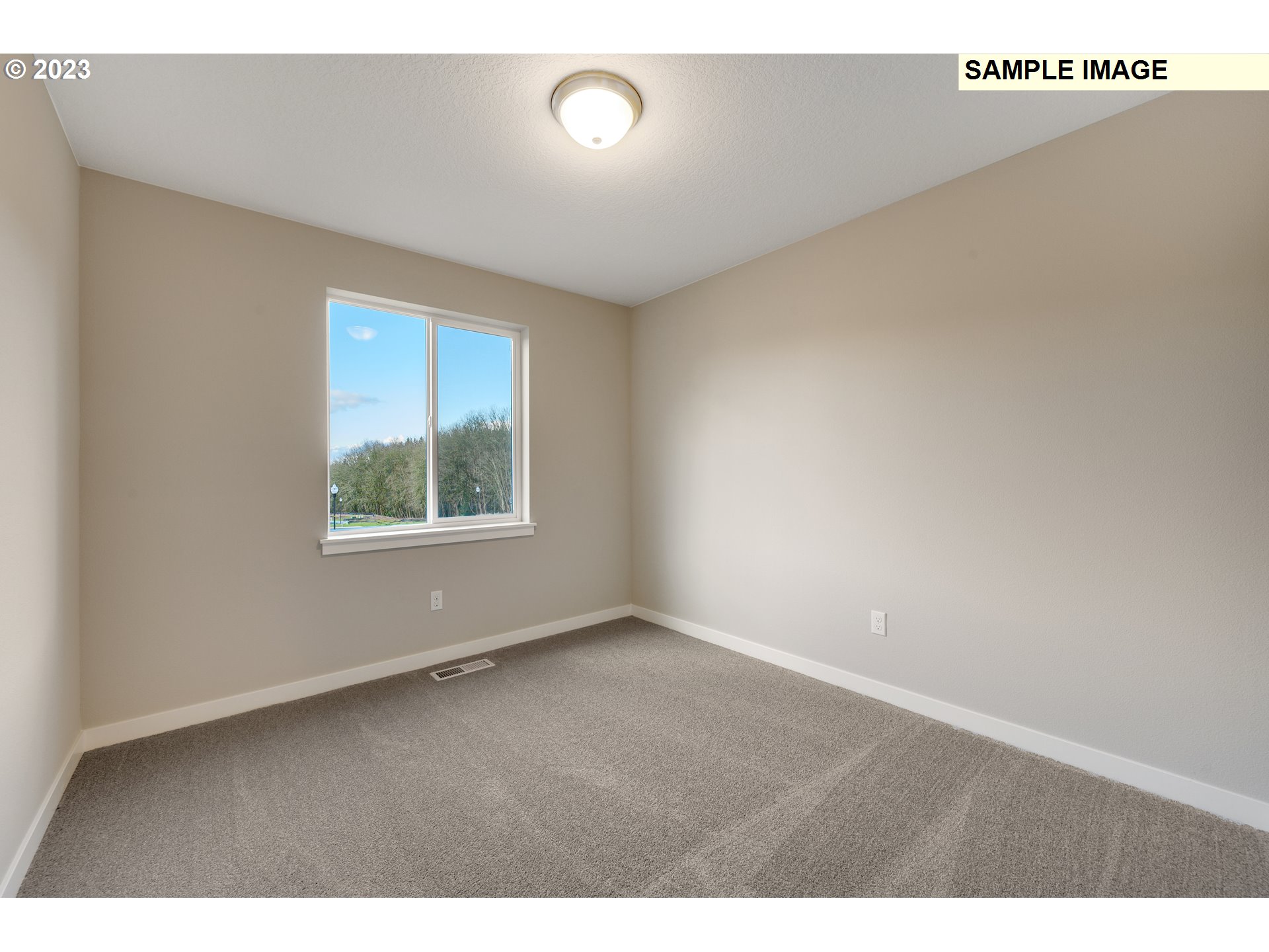16881 Southeast Mist Layer Loop, Unit 531 Happy Valley, OR 97086 - Photo 15 of 32 a view of an empty room with a window