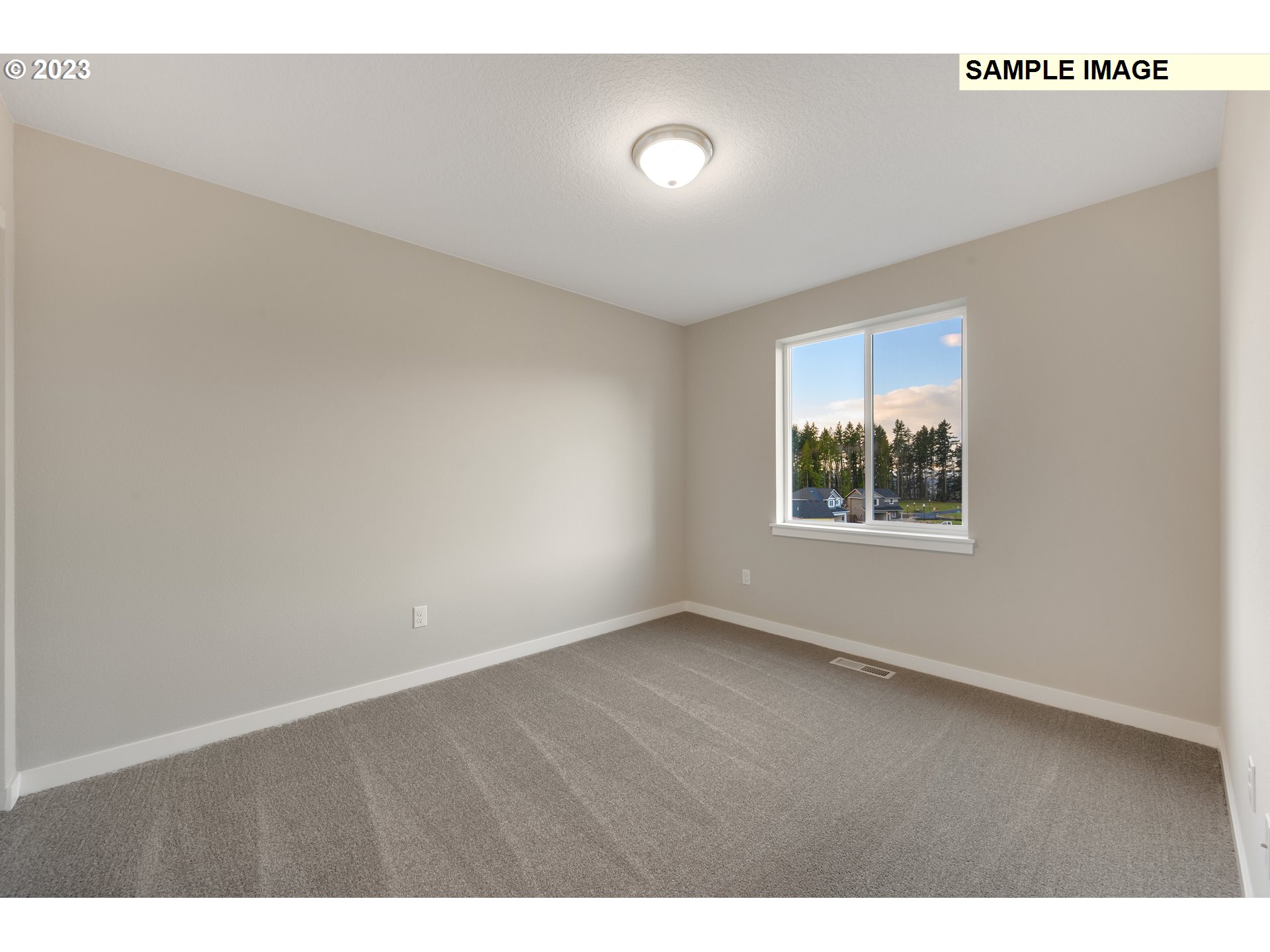 16881 Southeast Mist Layer Loop, Unit 531 Happy Valley, OR 97086 - Photo 17 of 32 a view of an empty room with a window