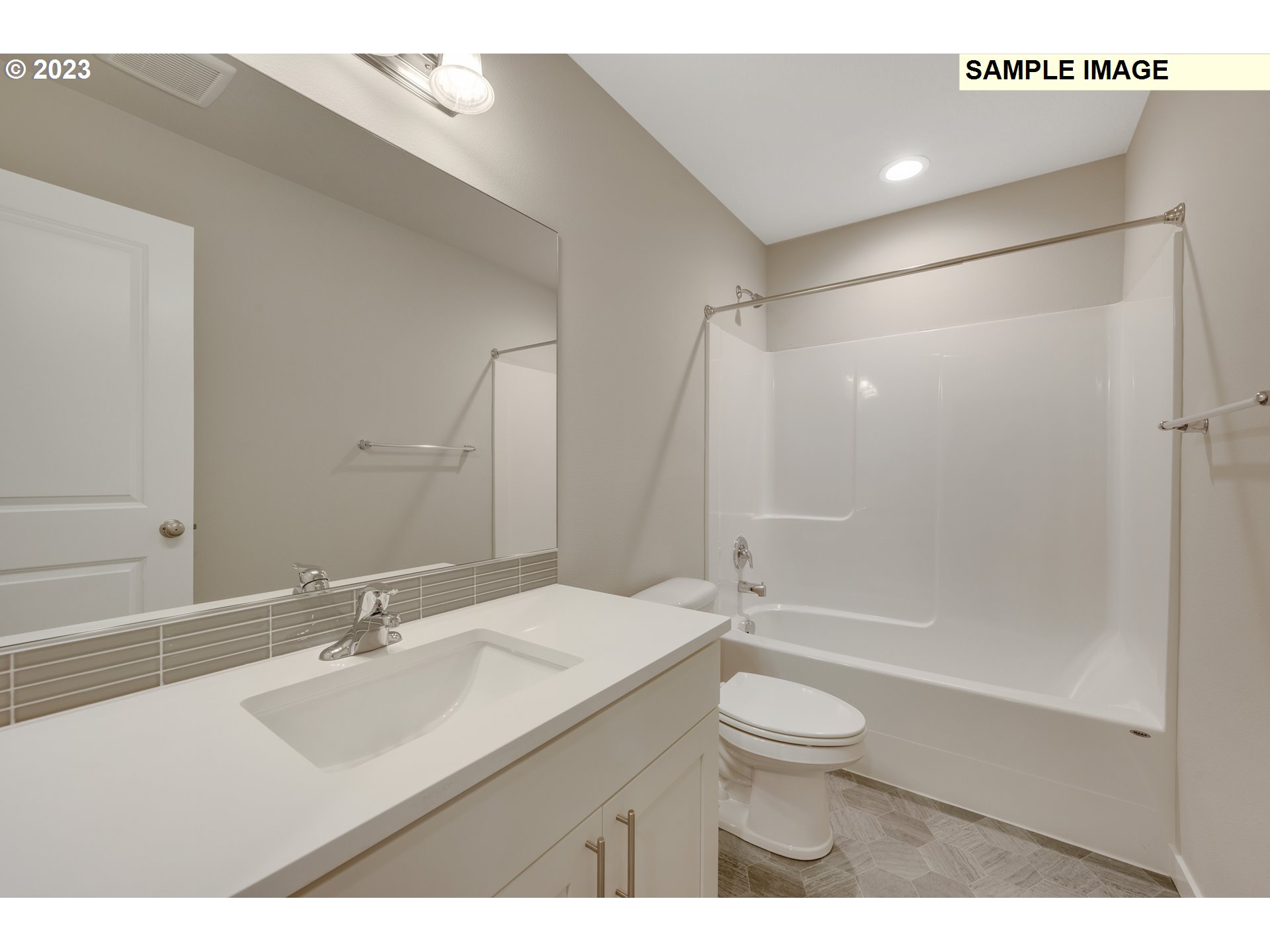 16881 Southeast Mist Layer Loop, Unit 531 Happy Valley, OR 97086 - Photo 18 of 32 a bathroom with a sink a toilet and shower