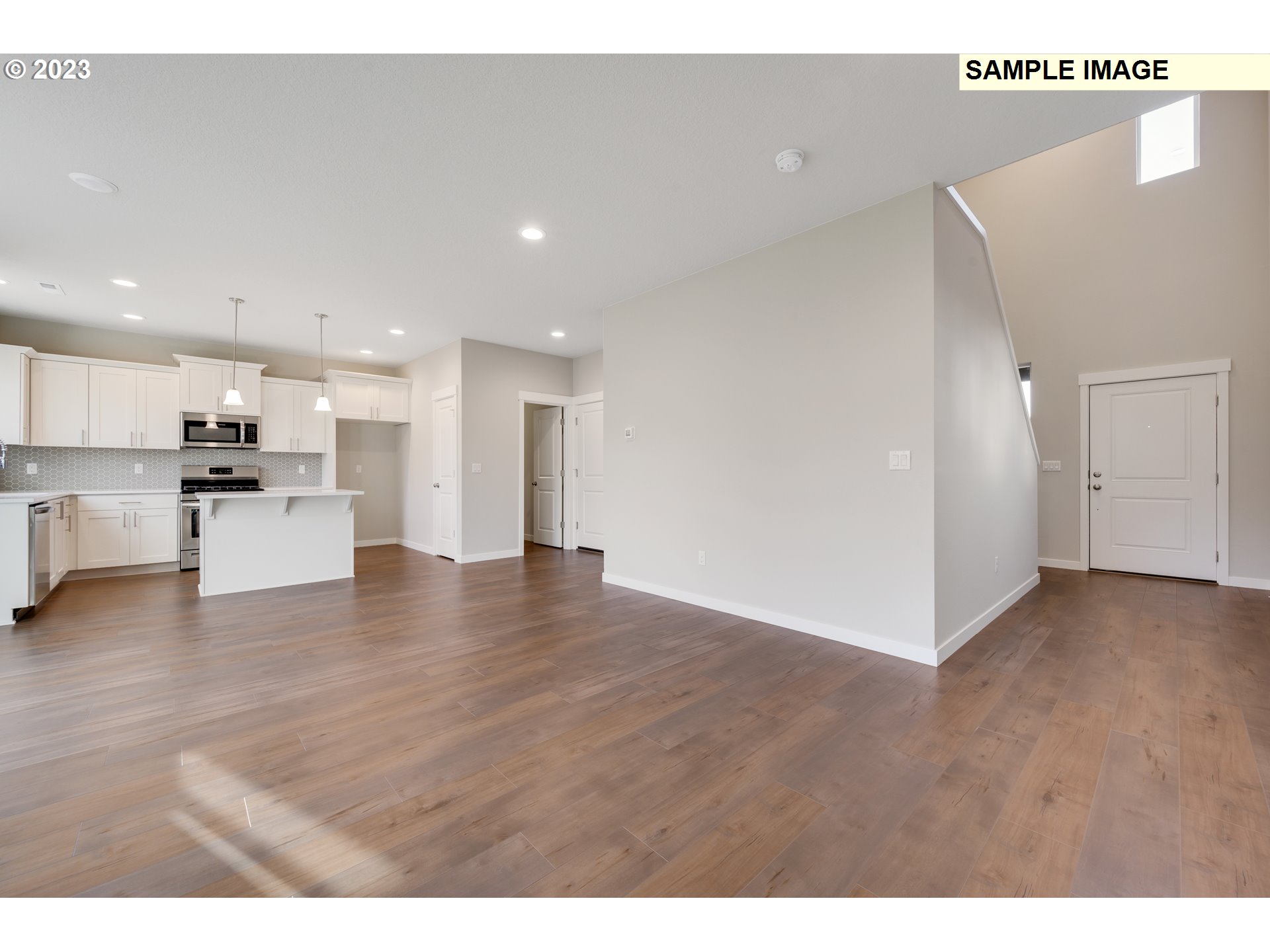 16881 Southeast Mist Layer Loop, Unit 531 Happy Valley, OR 97086 - Photo 20 of 32 a view of kitchen view with wooden floor