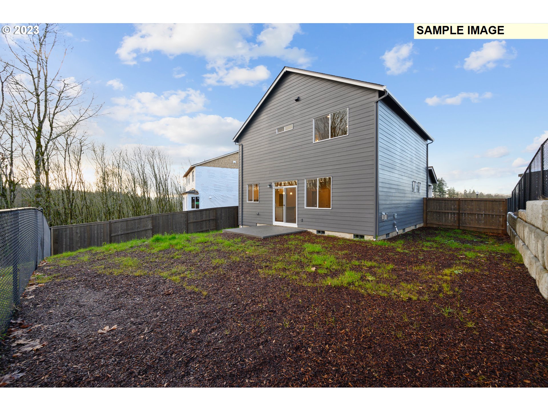 16881 Southeast Mist Layer Loop, Unit 531 Happy Valley, OR 97086 - Photo 30 of 32 a backyard of a house