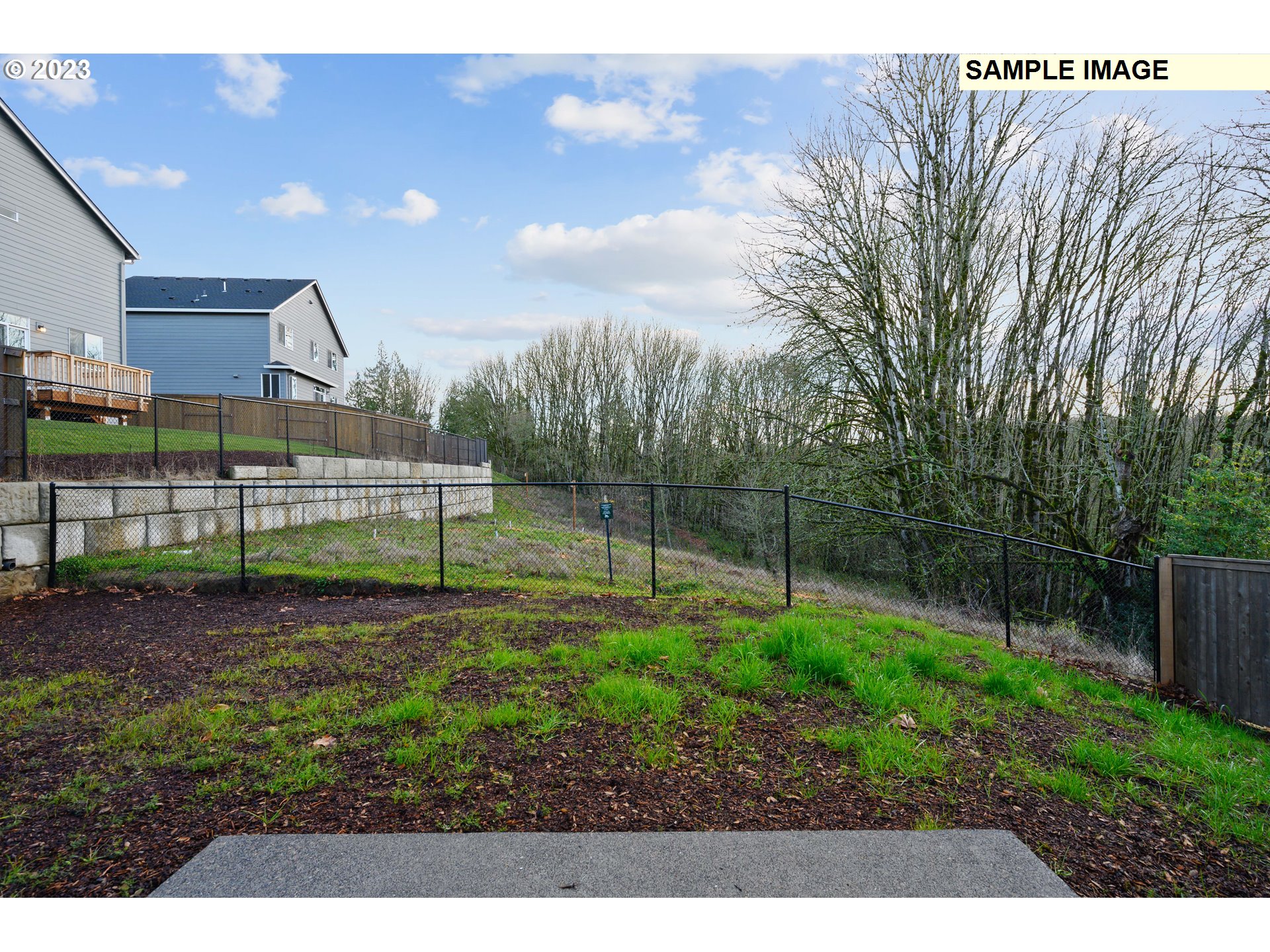 16881 Southeast Mist Layer Loop, Unit 531 Happy Valley, OR 97086 - Photo 32 of 32 a view of a backyard