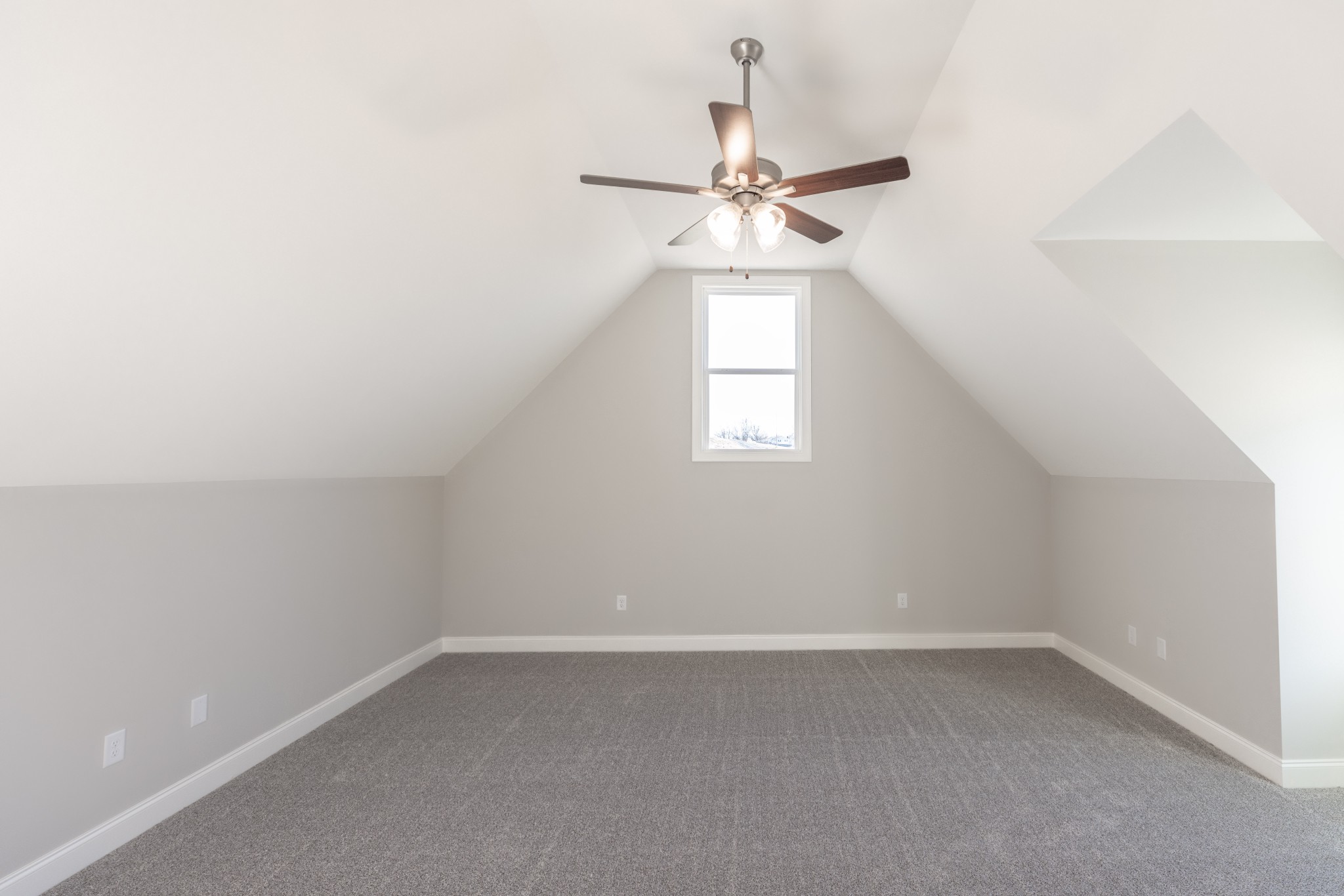 310 Woodruff Road Adams, TN 37010 - Photo 13 of 14 an empty room with a window and a fan