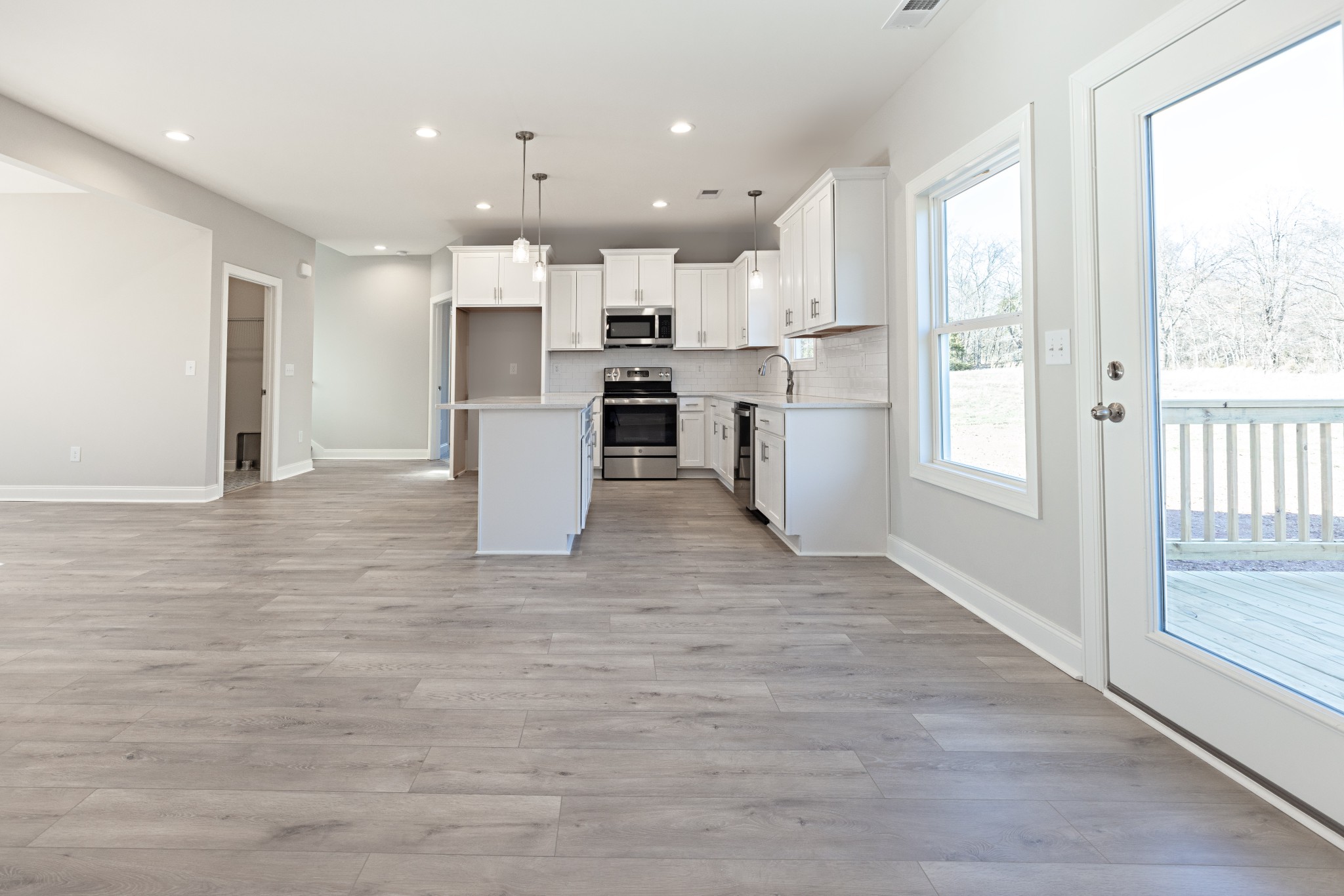 310 Woodruff Road Adams, TN 37010 - Photo 5 of 14 a view of kitchen with wooden floor