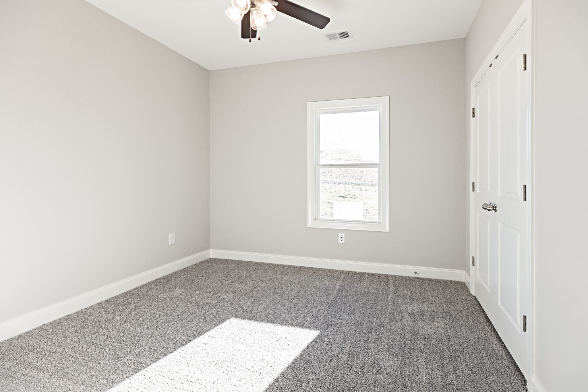 310 Woodruff Road Adams, TN 37010 - Photo 8 of 14 an empty room with windows