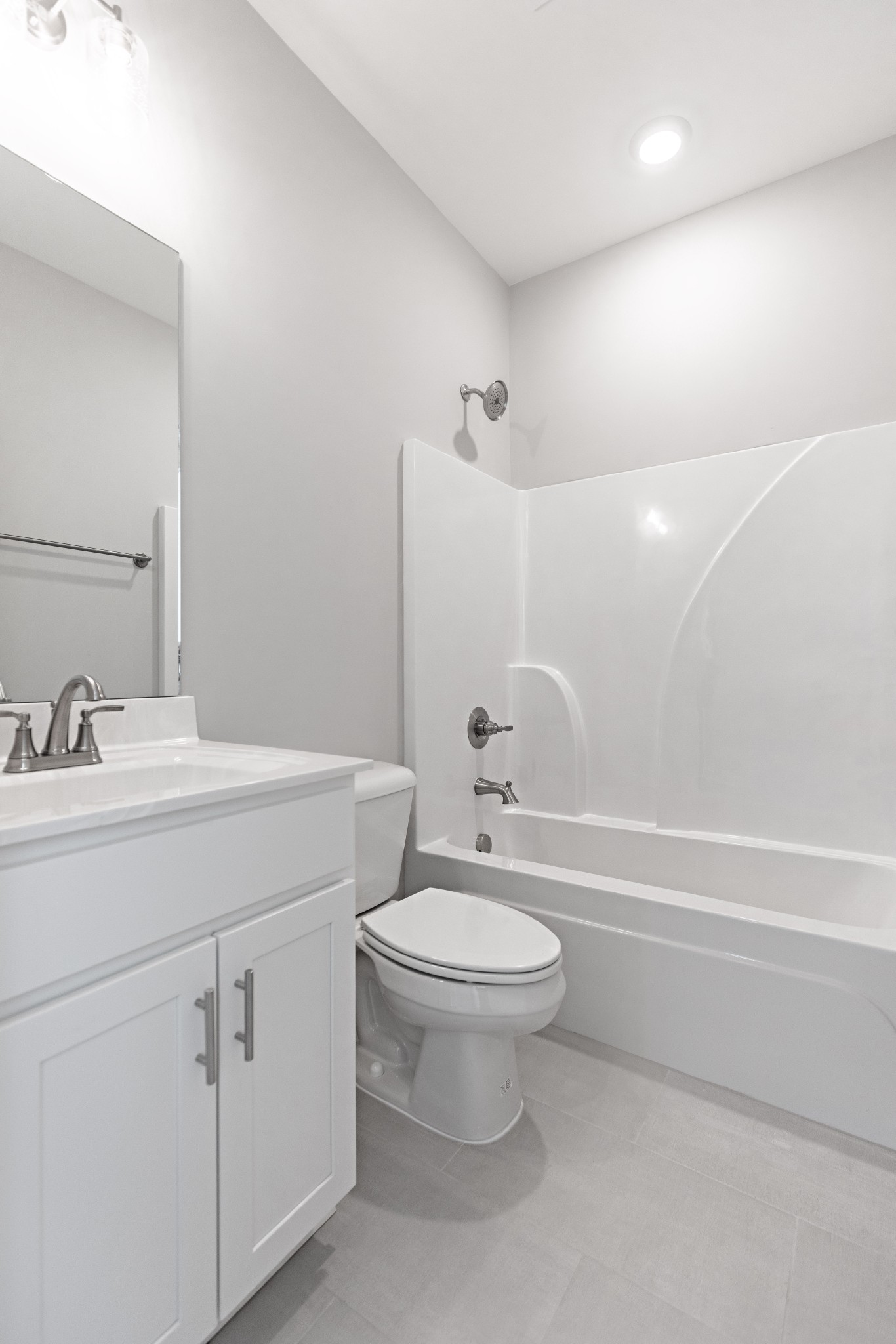 310 Woodruff Road Adams, TN 37010 - Photo 9 of 14 a bathroom with a toilet sink and mirror