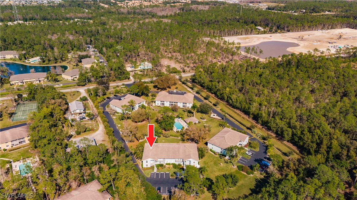 5737 Whitaker Road, Unit C201 Naples, FL 34112 - Photo 31 of 32 a view of lake view and mountain view