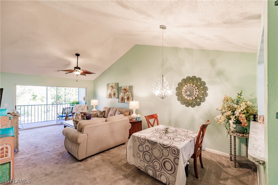 5737 Whitaker Road, Unit C201 Naples, FL 34112 - Photo 8 of 32 a living room with furniture