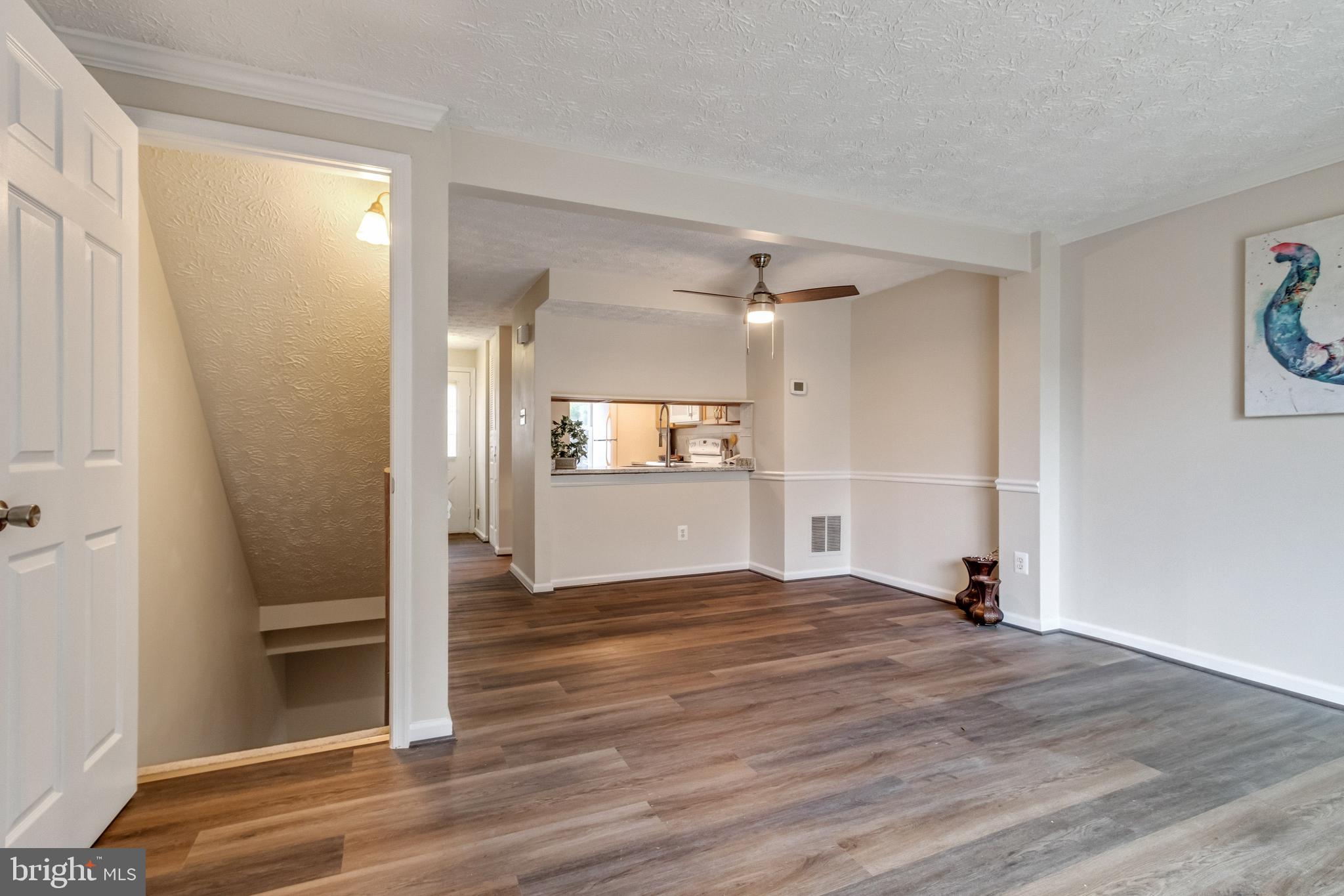 8344 Bark Tree Court Springfield, VA 22153 - Photo 12 of 31 Open dining area and living room