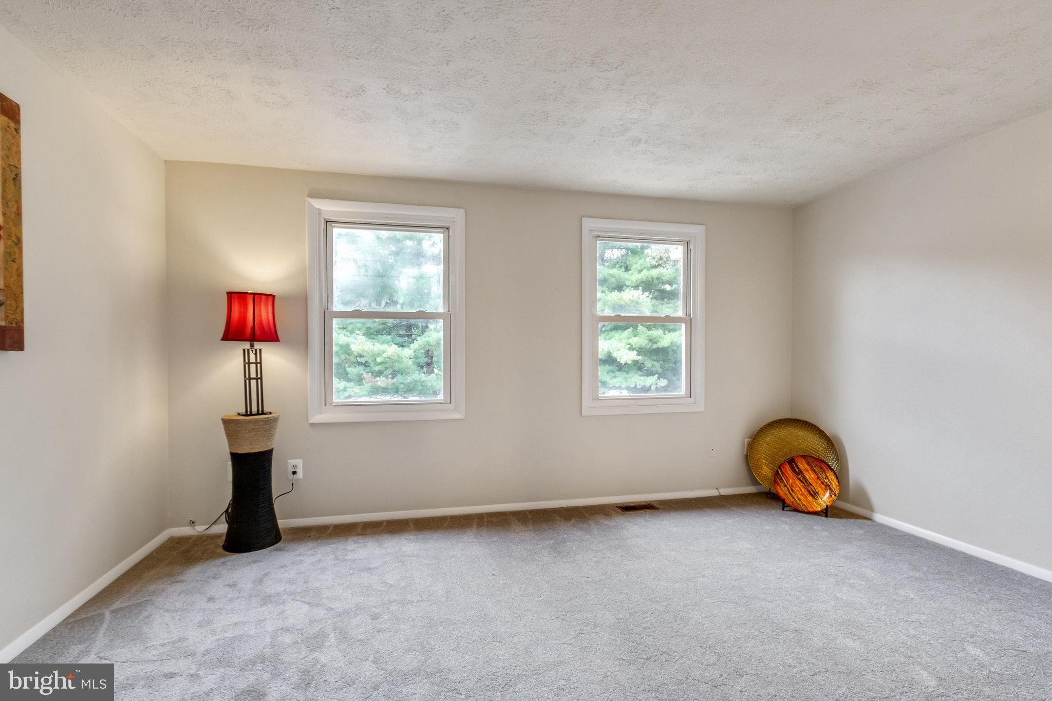 8344 Bark Tree Court Springfield, VA 22153 - Photo 14 of 31 Nice primary bedroom with plenty of light
