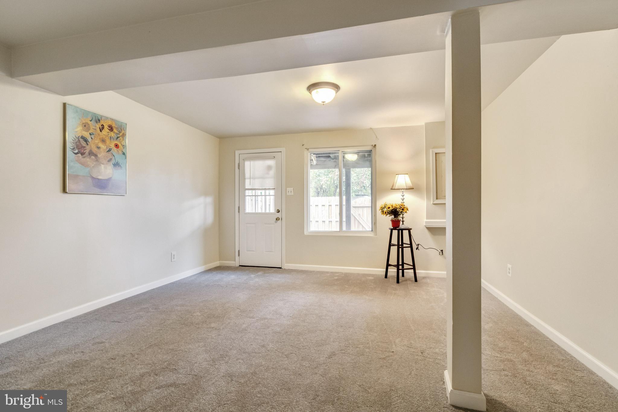 8344 Bark Tree Court Springfield, VA 22153 - Photo 24 of 31 Basement rec room walks out to the patio.