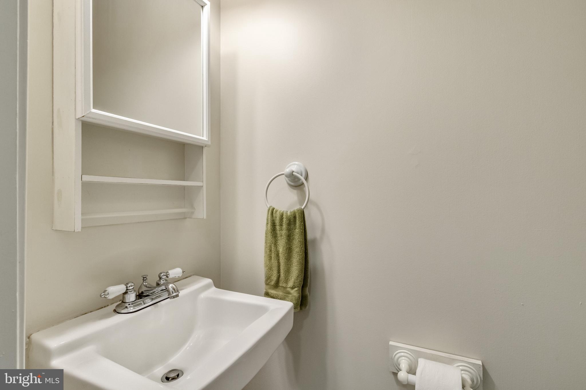 8344 Bark Tree Court Springfield, VA 22153 - Photo 4 of 31 Main floor powder room as you enter