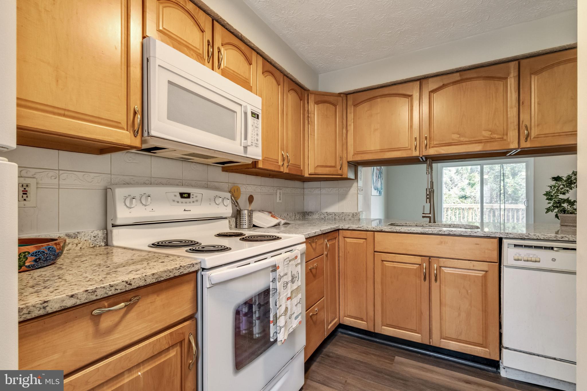 8344 Bark Tree Court Springfield, VA 22153 - Photo 6 of 31 The pass through opens the space!