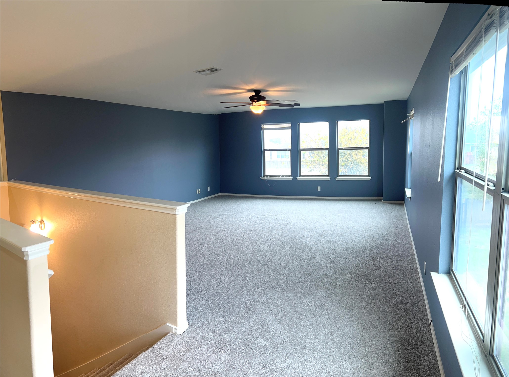 160 Mistletoe Lane Kyle, TX 78640 - Photo 11 of 29 a view of a livingroom with a ceiling fan and window