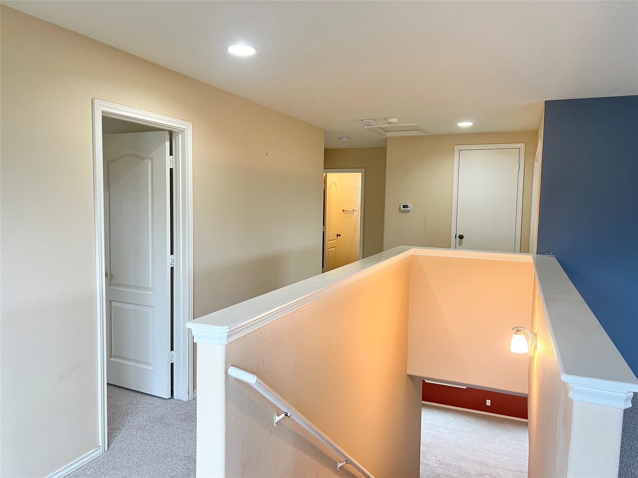 160 Mistletoe Lane Kyle, TX 78640 - Photo 13 of 29 a view of a big room with closet and wooden floor