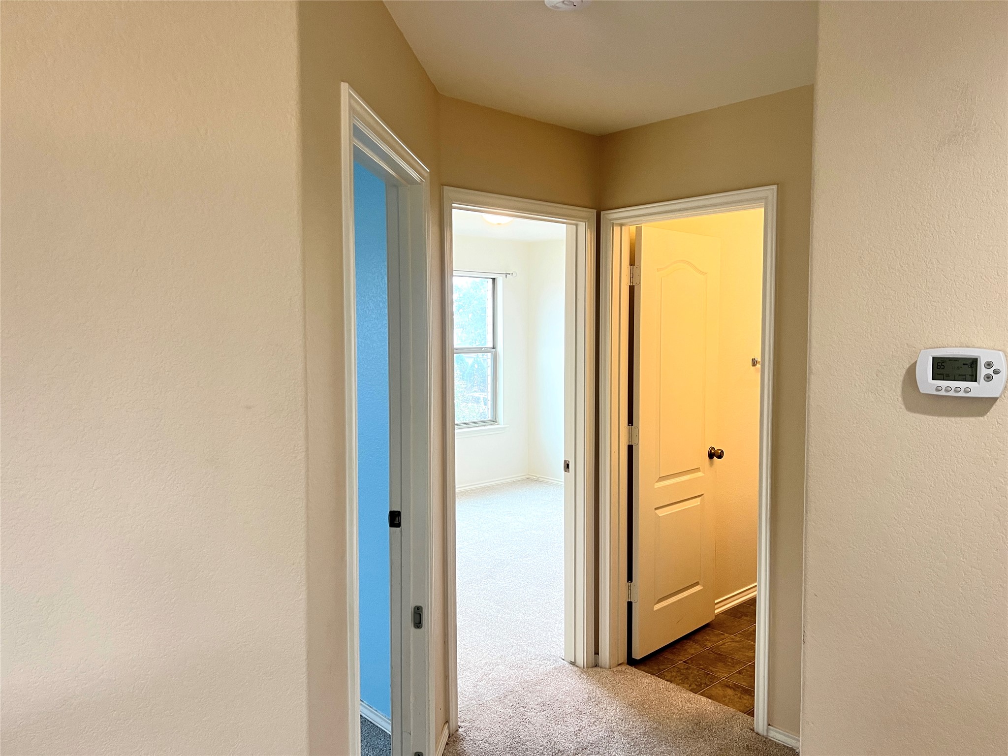 160 Mistletoe Lane Kyle, TX 78640 - Photo 14 of 29 a view of a bathroom with a glass door
