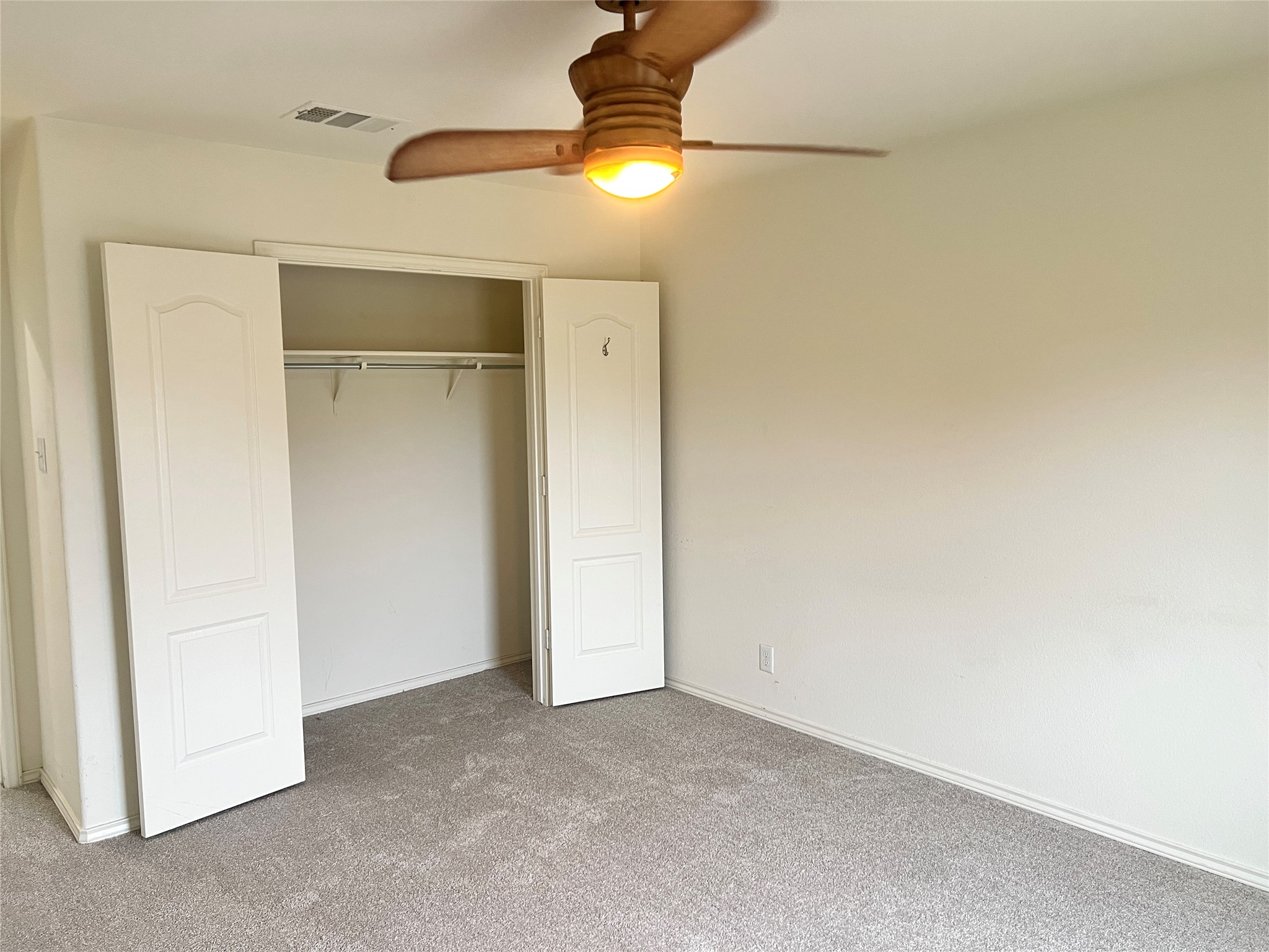 160 Mistletoe Lane Kyle, TX 78640 - Photo 16 of 29 a view of a room with a ceiling fan