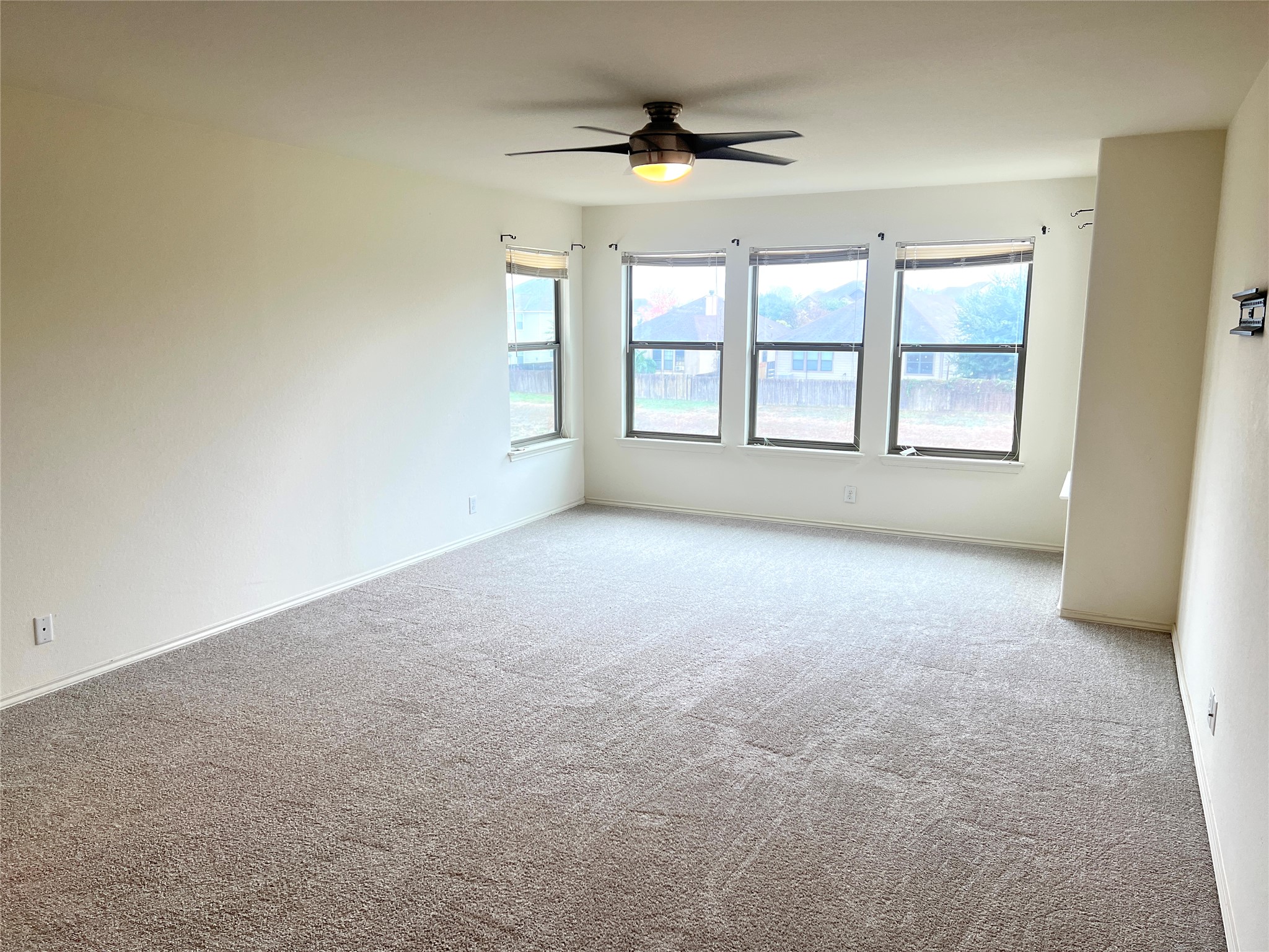 160 Mistletoe Lane Kyle, TX 78640 - Photo 22 of 29 a view of an empty room with a window