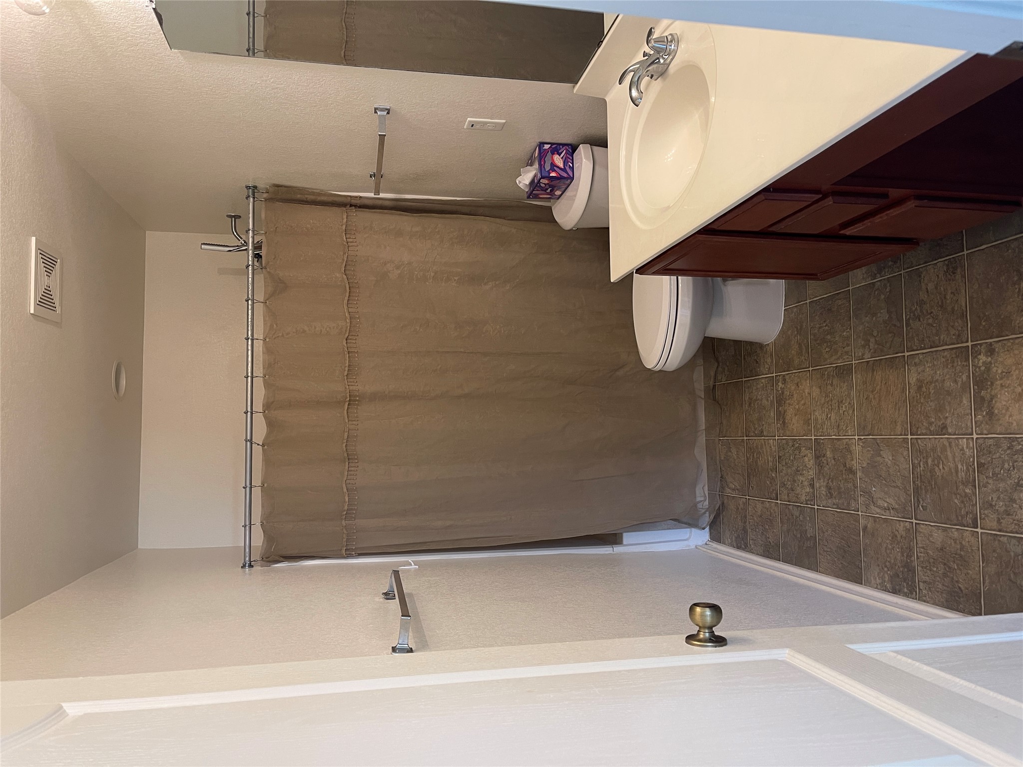 160 Mistletoe Lane Kyle, TX 78640 - Photo 26 of 29 a bathroom with a sink a toilet and shower