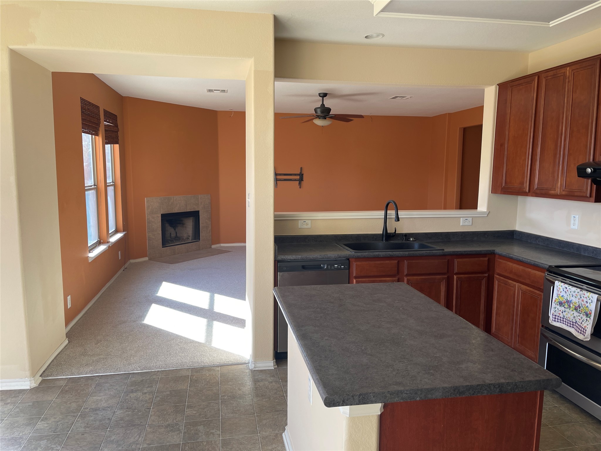 160 Mistletoe Lane Kyle, TX 78640 - Photo 27 of 29 a kitchen with stainless steel appliances granite countertop a sink and a stove