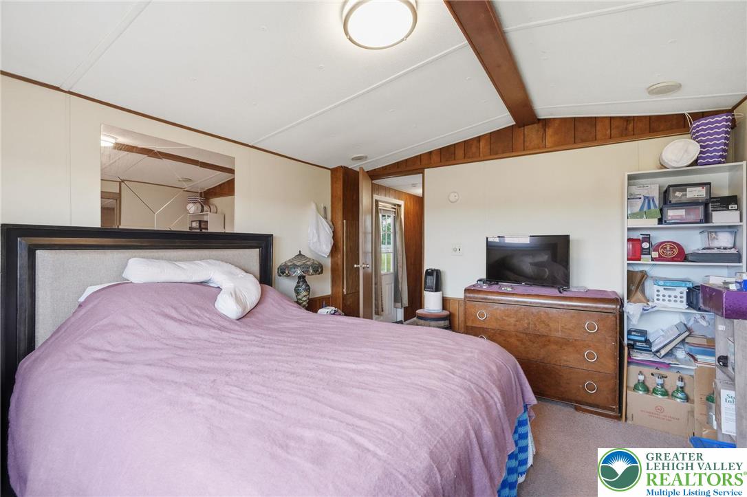 3101 Newburg Road Nazareth, PA 18064 - Photo 15 of 23 a bedroom with a bed and flat screen tv