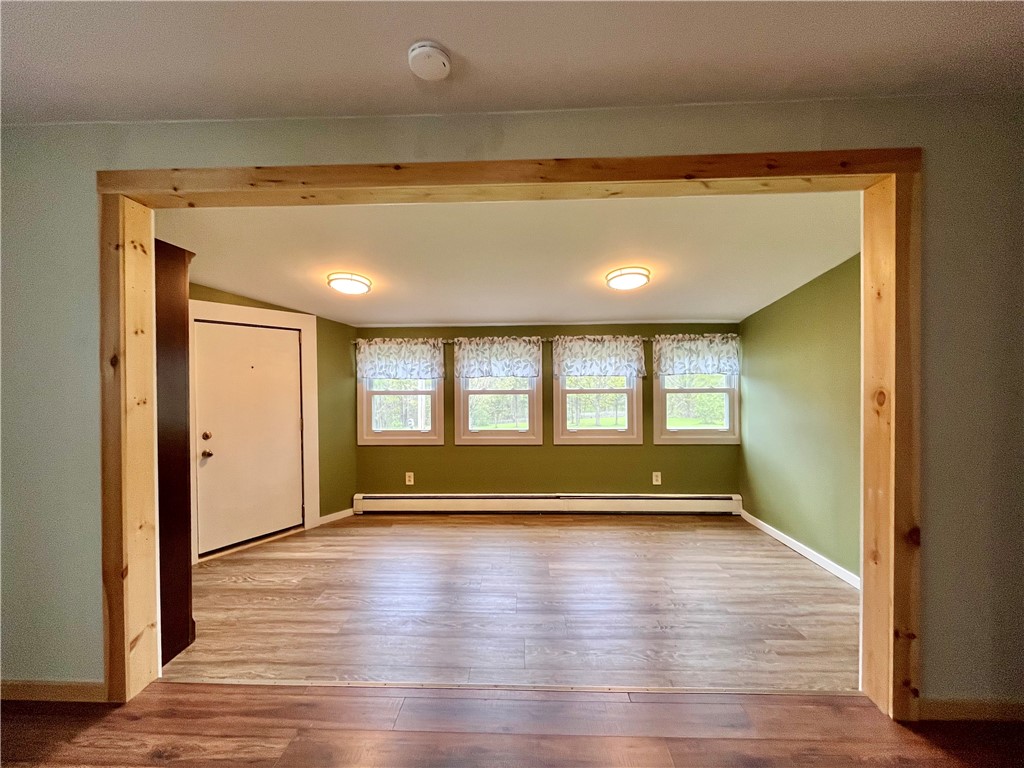 558 Sterling Station Road Sterling, NY 13143 - Photo 22 of 45 Wall of windows to let in all that natural light