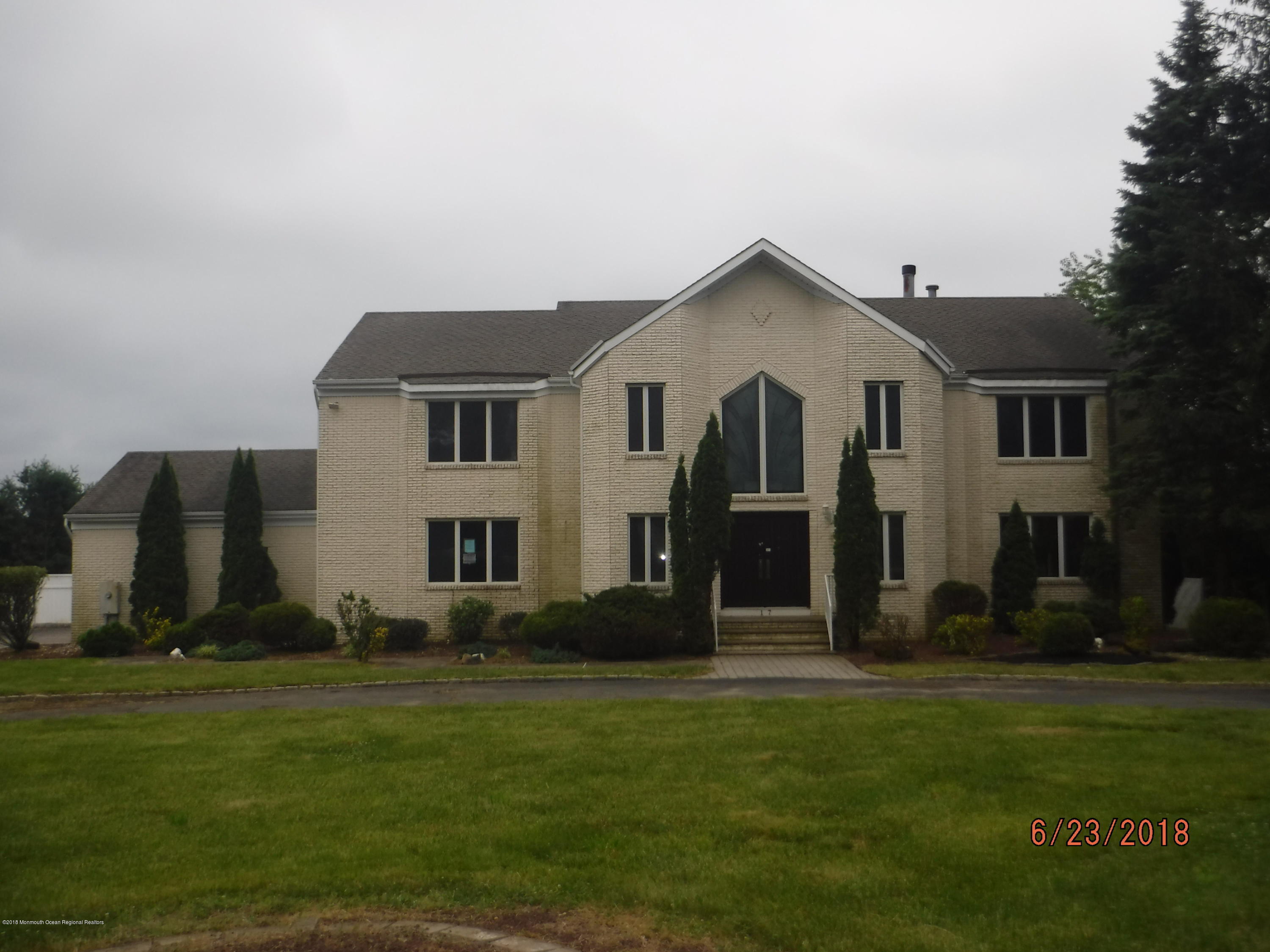 17 Crow Hill Road Freehold, NJ 07728 - Photo 1 of 44 a front view of a house with a yard