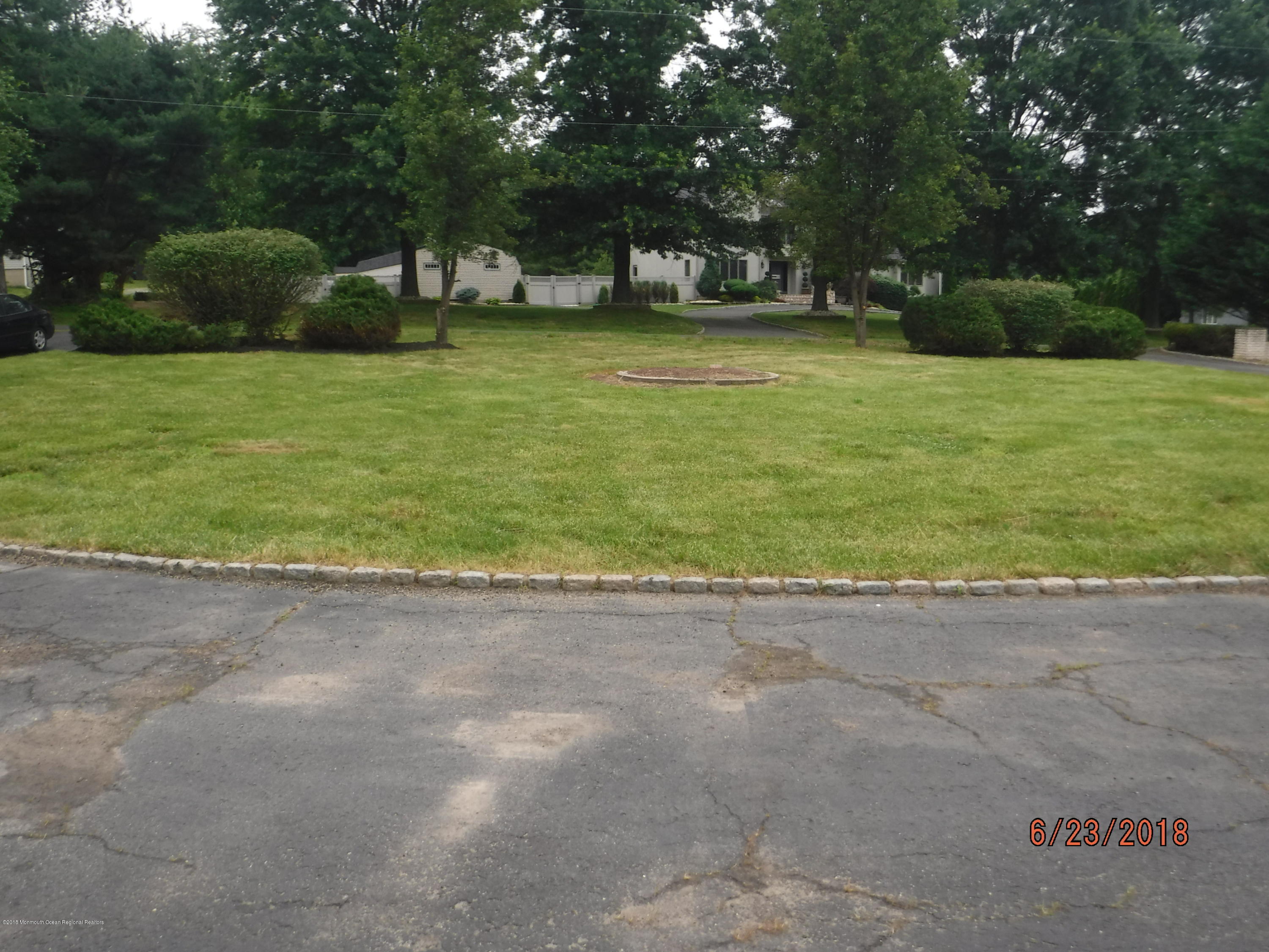 17 Crow Hill Road Freehold, NJ 07728 - Photo 13 of 44 a front view of a house with a yard
