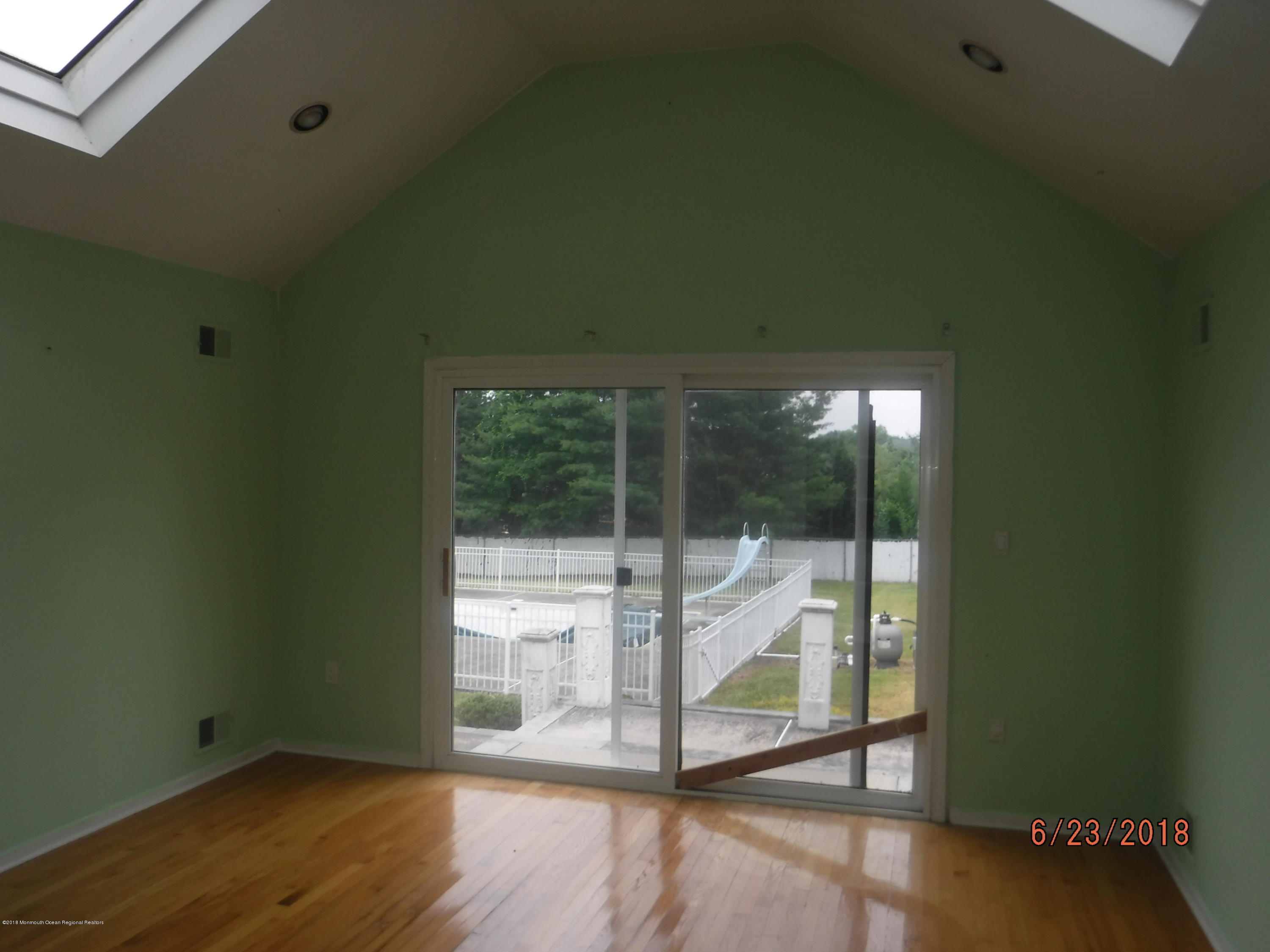 17 Crow Hill Road Freehold, NJ 07728 - Photo 21 of 44 a view of a room with wooden floor and windows