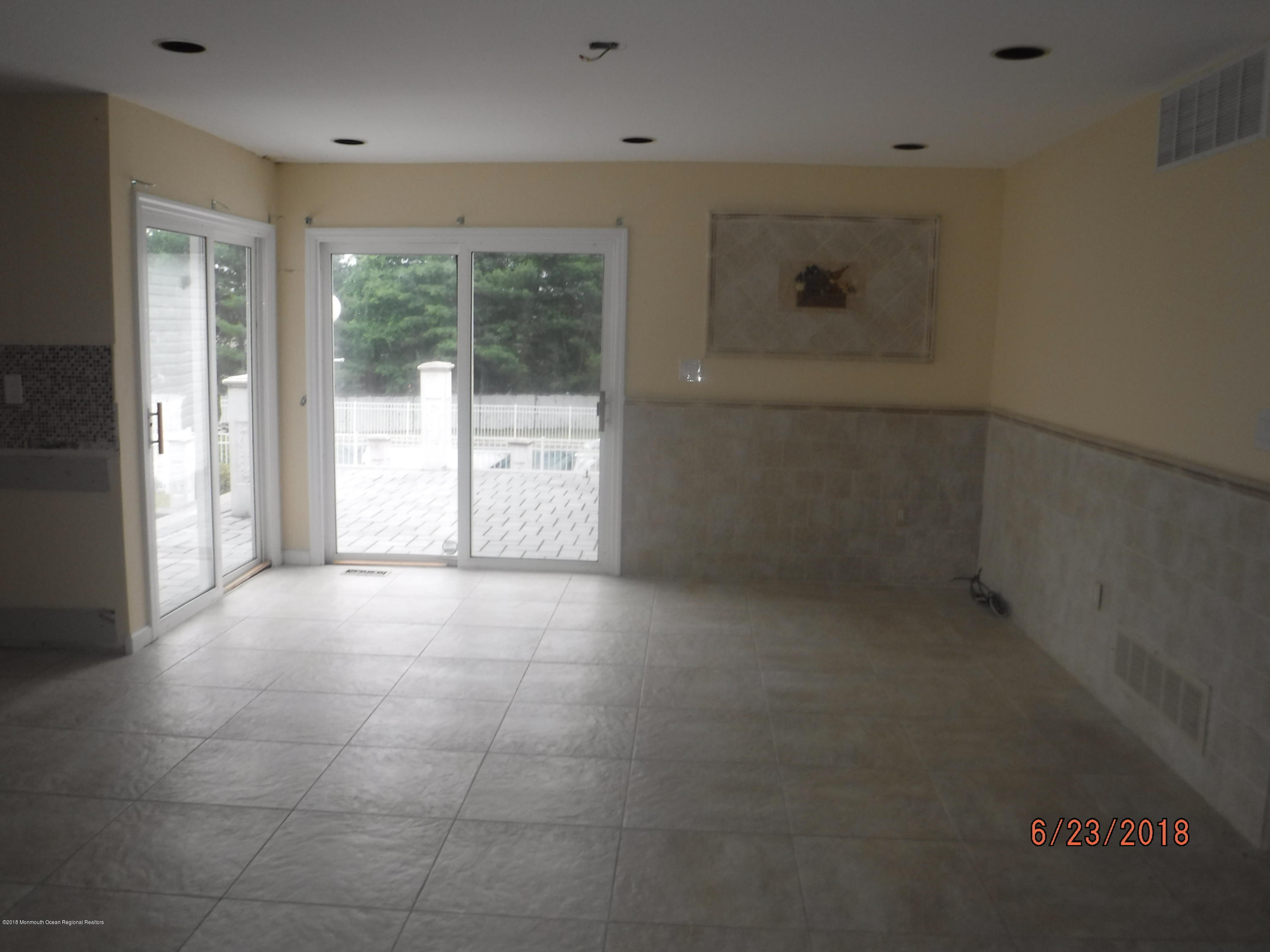 17 Crow Hill Road Freehold, NJ 07728 - Photo 23 of 44 a view of a hallway with a window