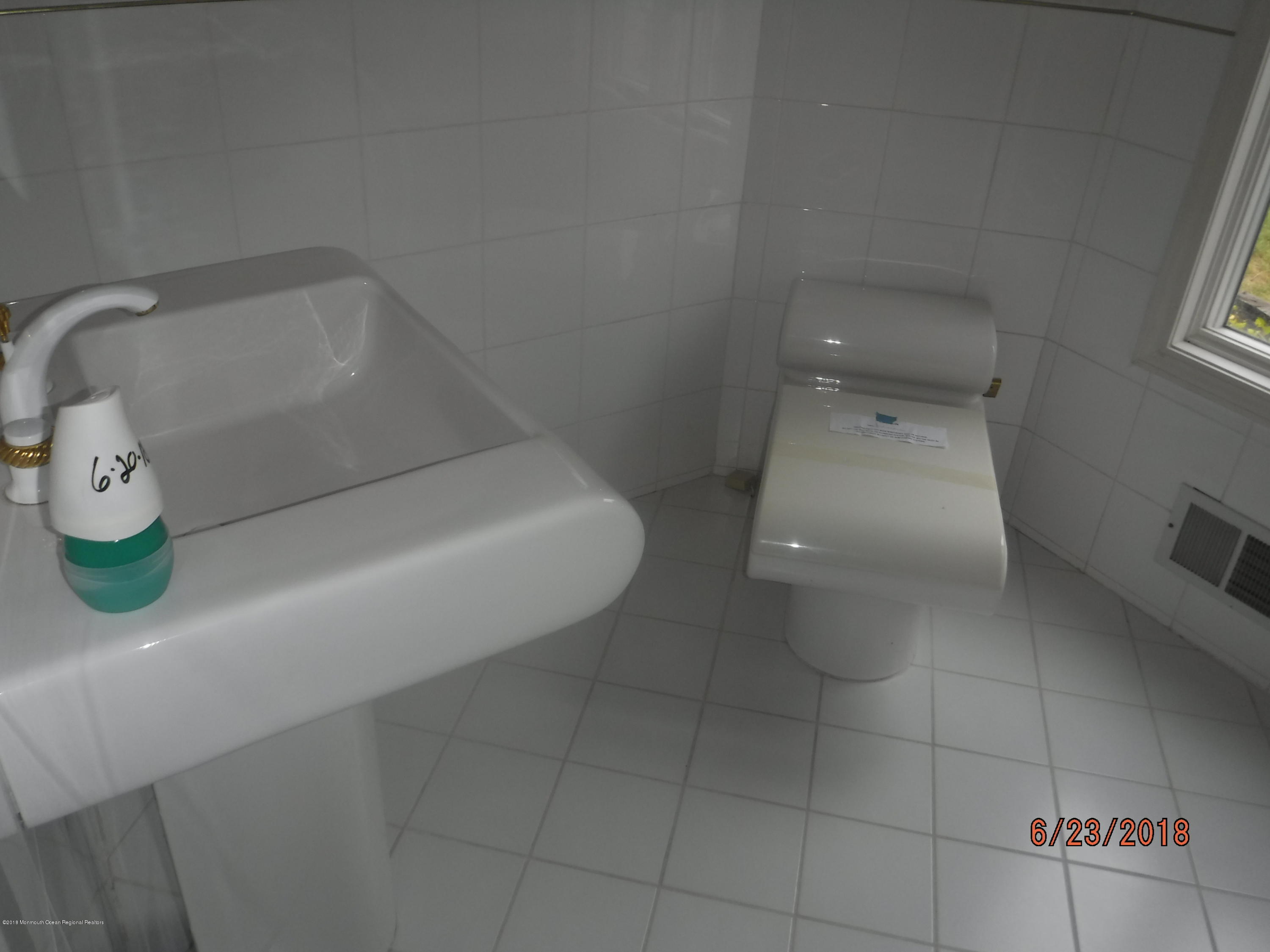 17 Crow Hill Road Freehold, NJ 07728 - Photo 25 of 44 a bathroom with a sink and toilet