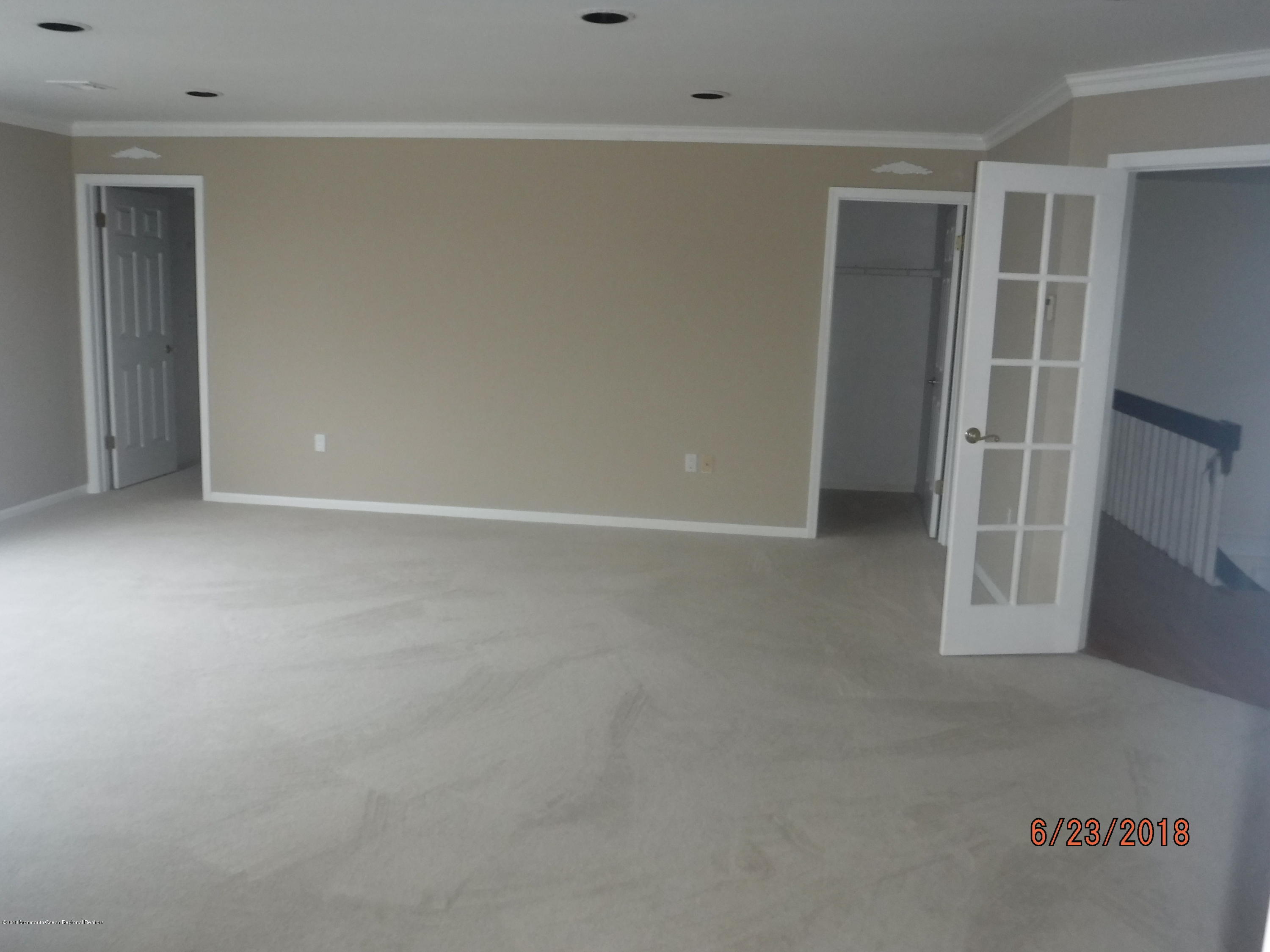 17 Crow Hill Road Freehold, NJ 07728 - Photo 27 of 44 an empty room with windows
