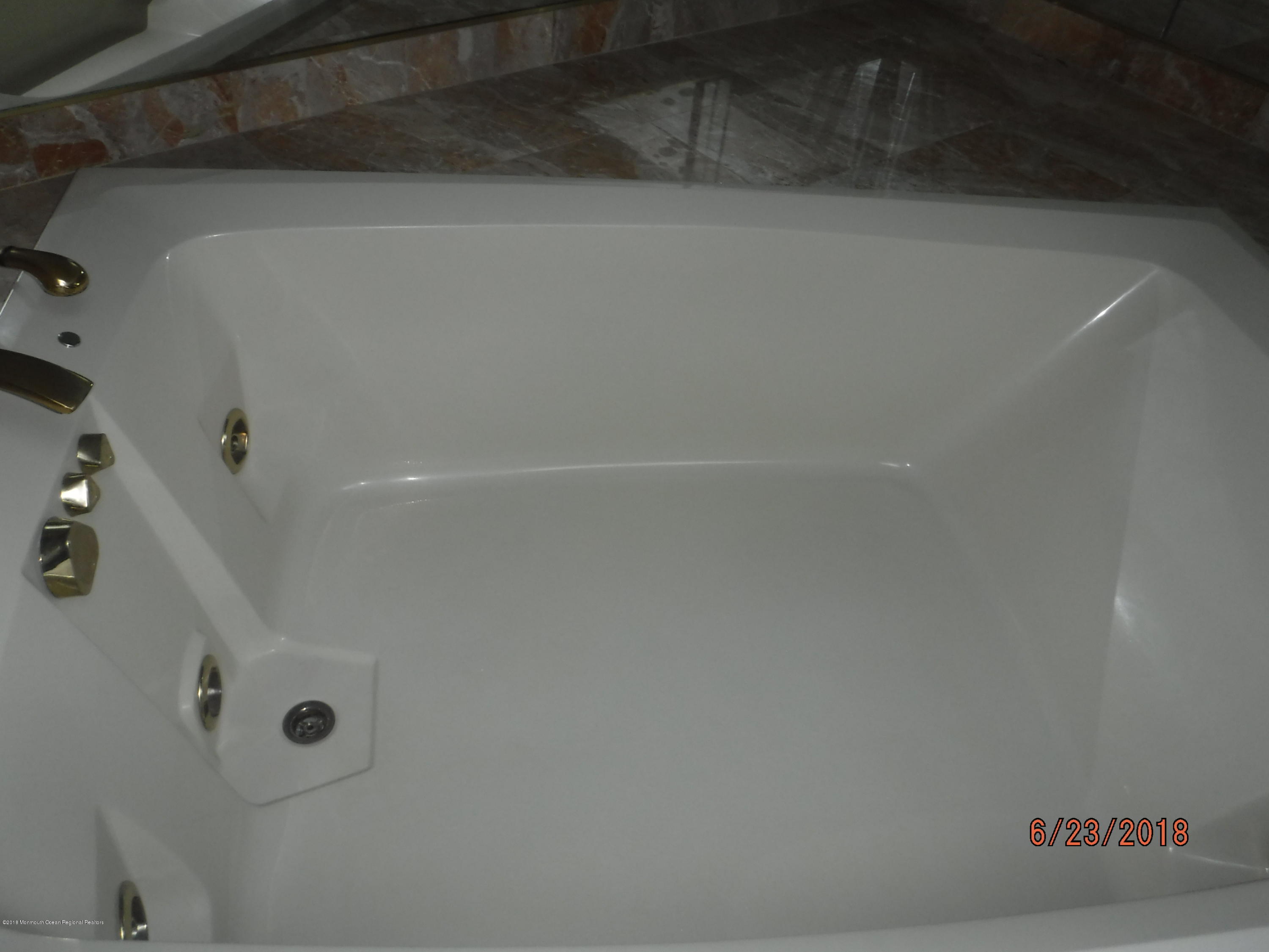17 Crow Hill Road Freehold, NJ 07728 - Photo 30 of 44 a close view of shower tap