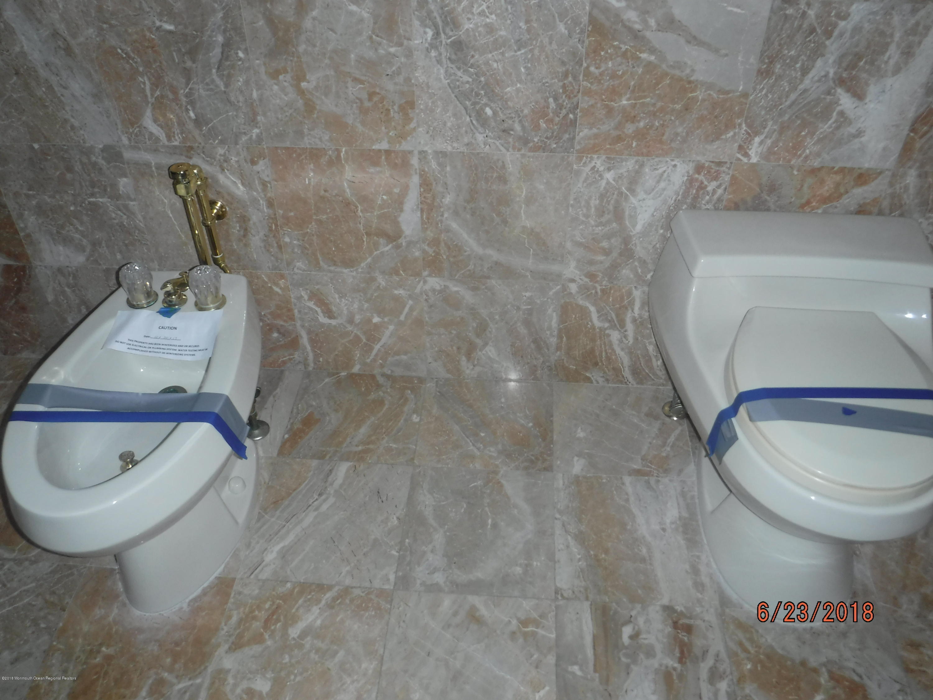 17 Crow Hill Road Freehold, NJ 07728 - Photo 31 of 44 a bathroom with a toilet and a sink
