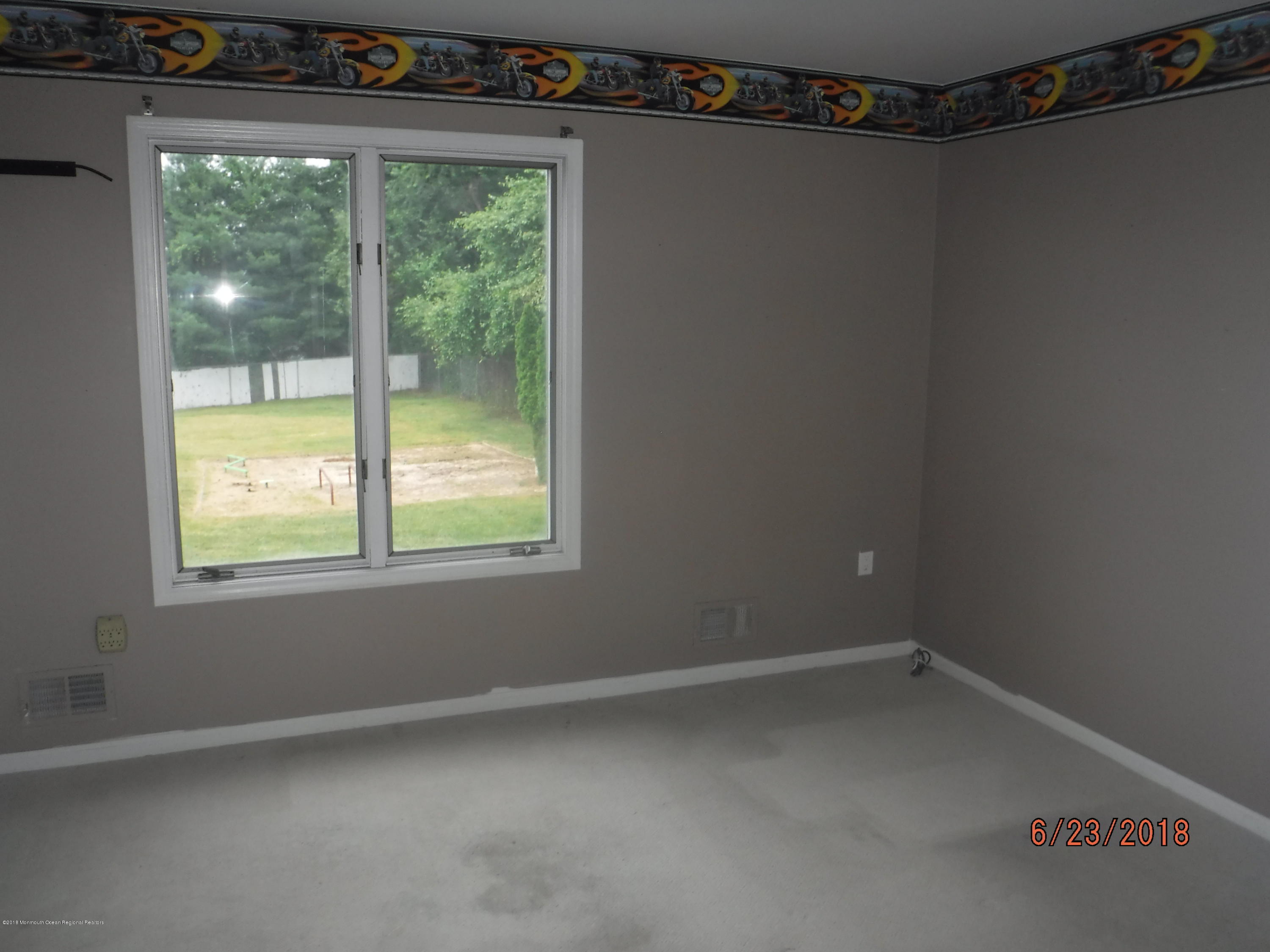 17 Crow Hill Road Freehold, NJ 07728 - Photo 32 of 44 a view of a window in an empty room