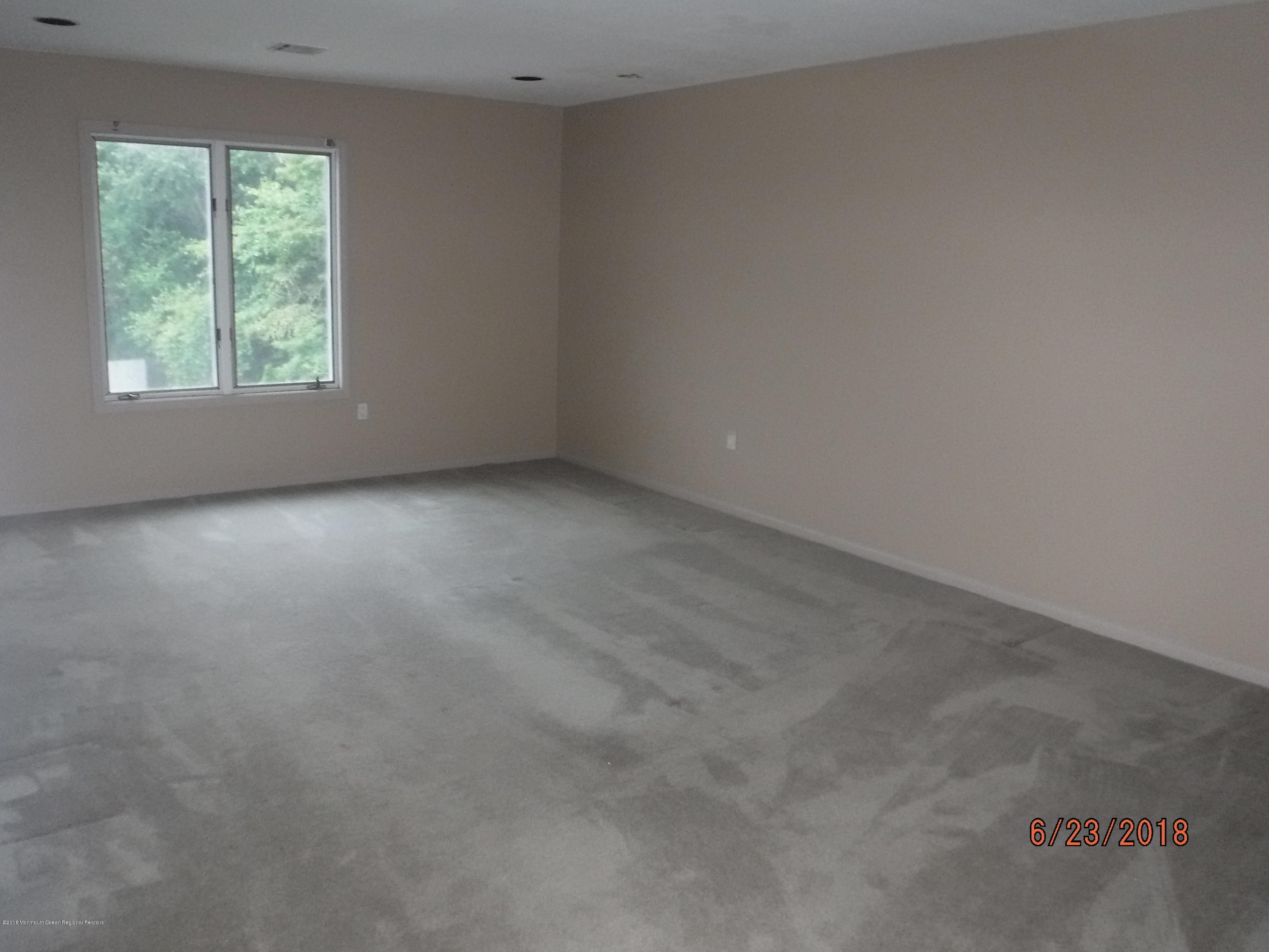 17 Crow Hill Road Freehold, NJ 07728 - Photo 34 of 44 an empty room with a window